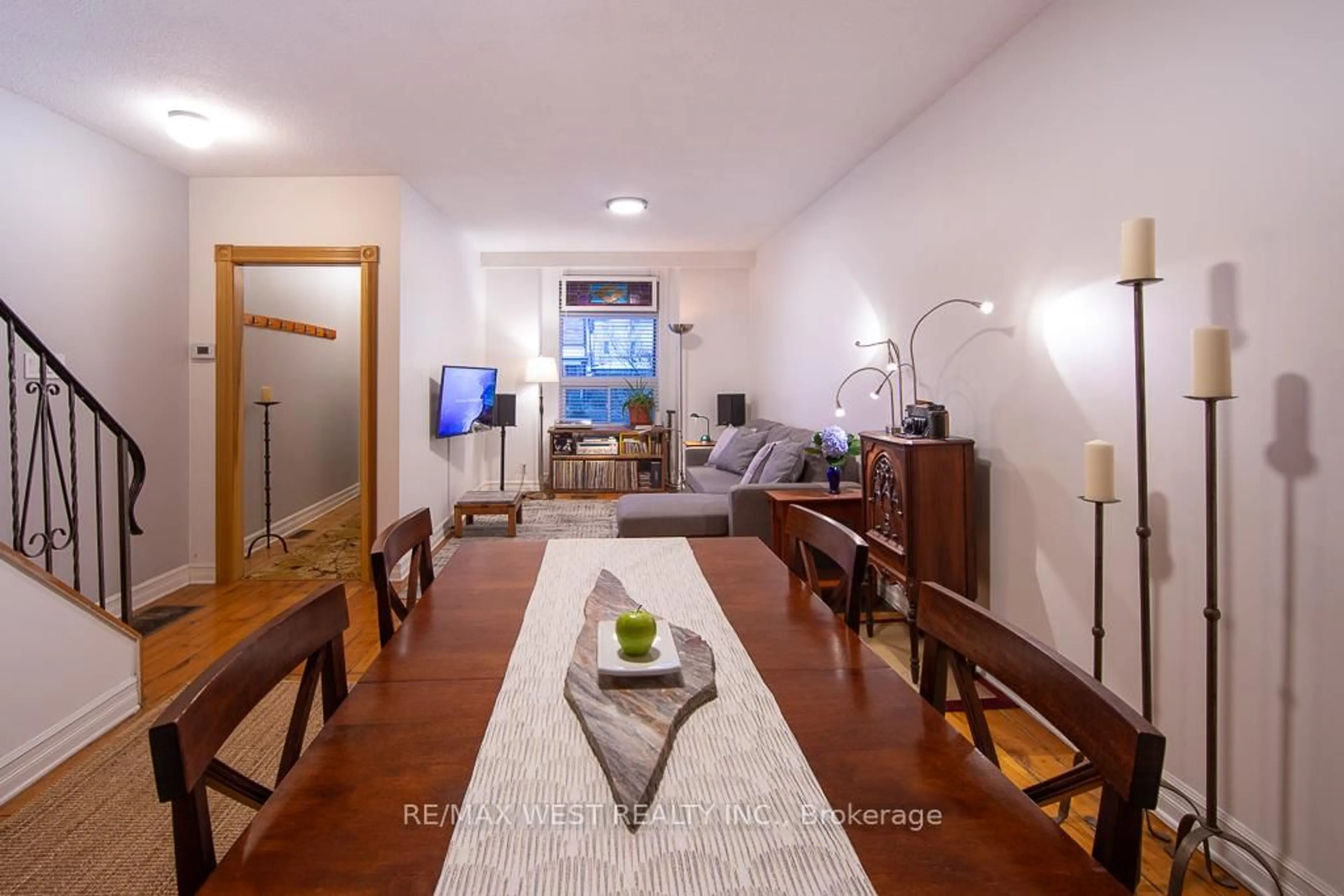 Living room with furniture, wood/laminate floor for 509 Perth Ave, Toronto Ontario M6N 2W6