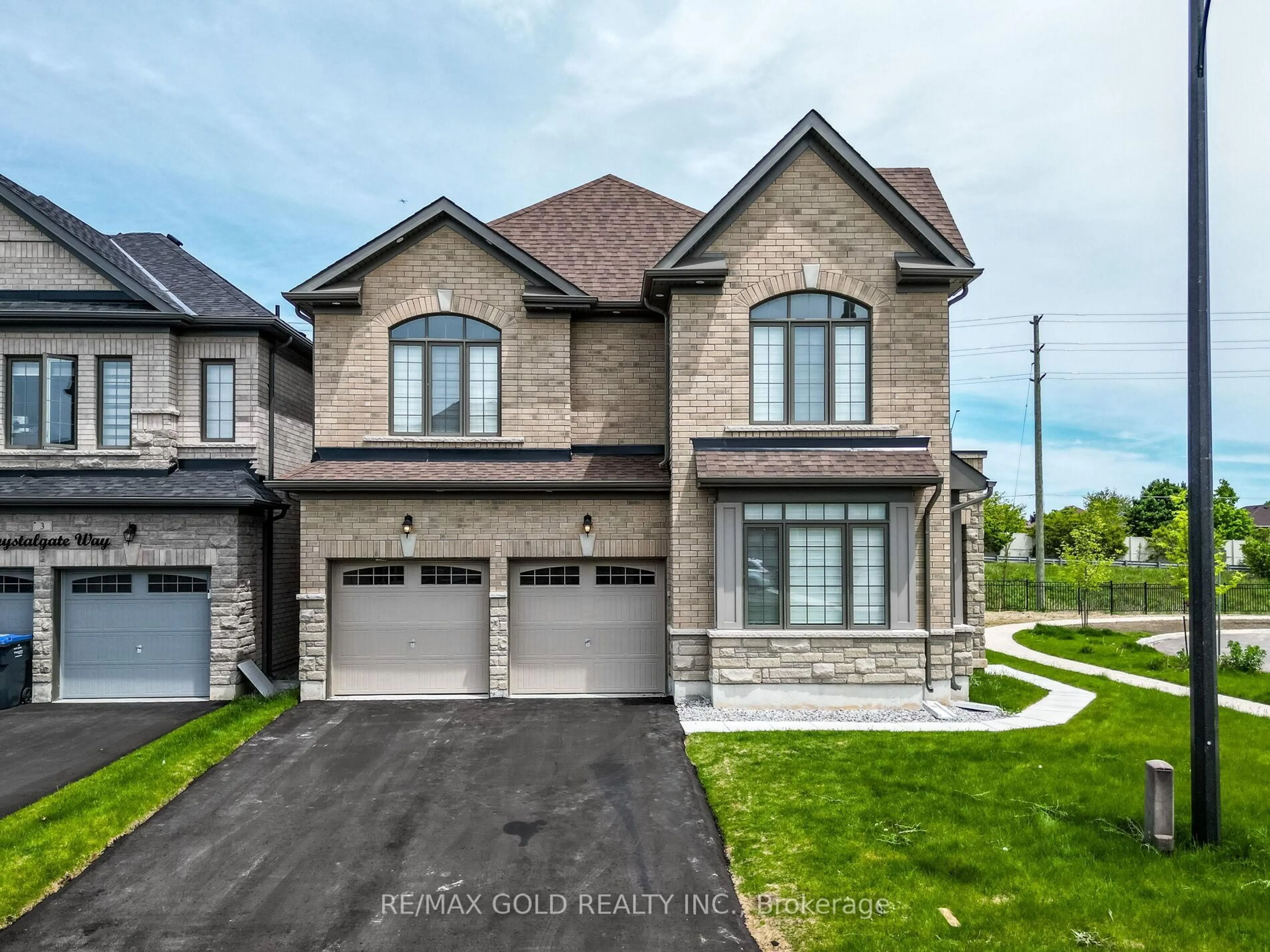 Home with brick exterior material, street for 73 Eastman Dr, Brampton Ontario L6X 5S5