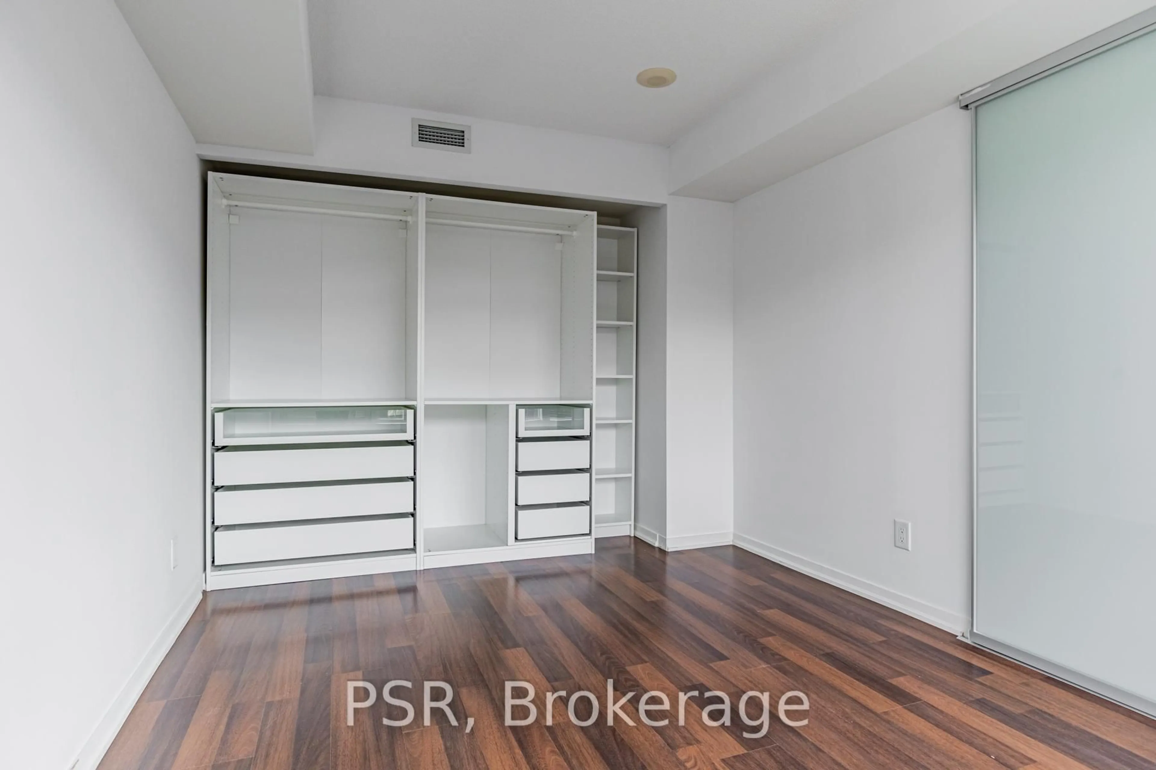 Storage room or clothes room or walk-in closet for 38 Joe Shuster Way #201, Toronto Ontario M6K 0A5
