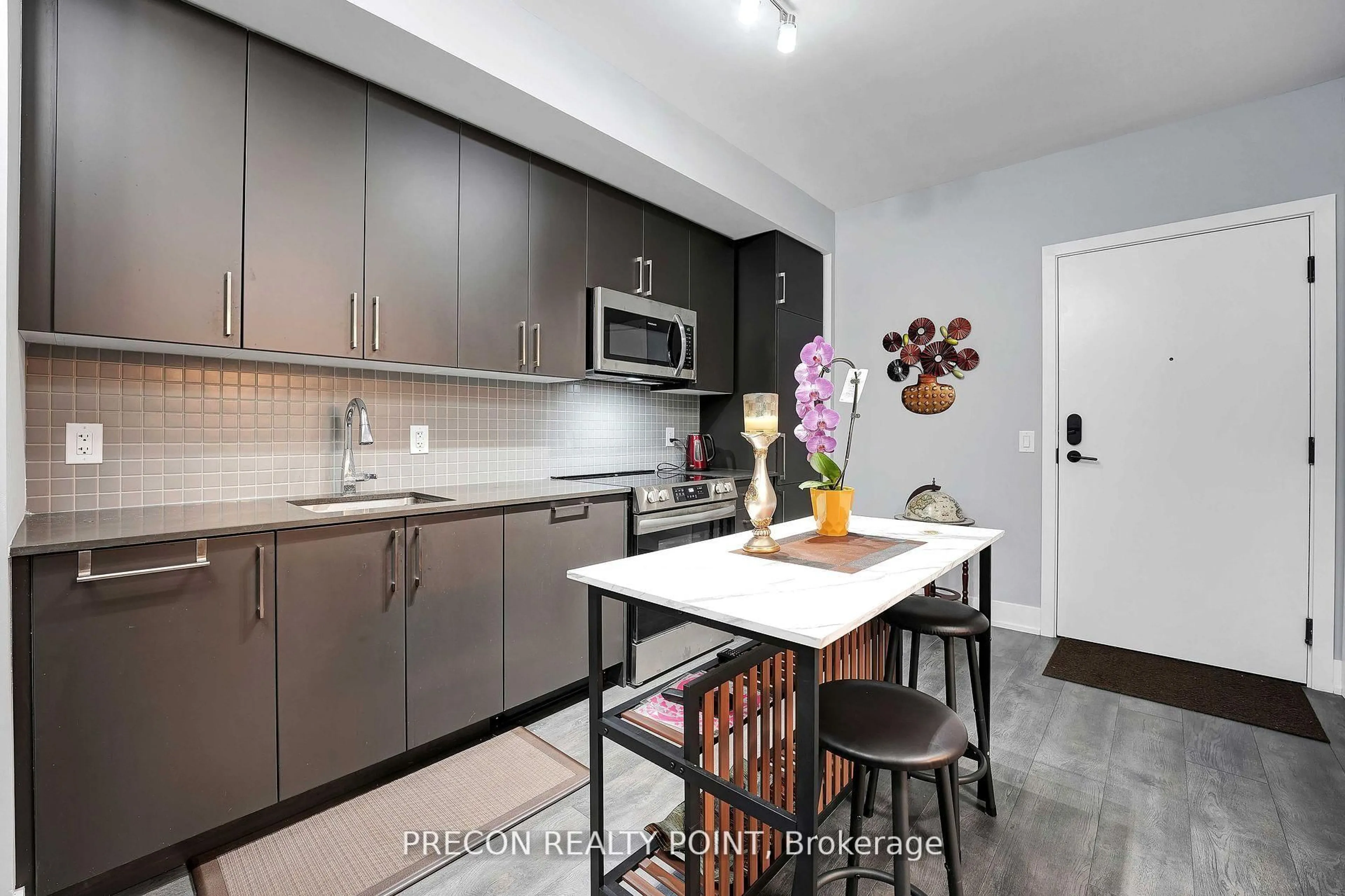 Open concept kitchen, unknown for 2450 Old Bronte Rd #322, Oakville Ontario L5M 5P6