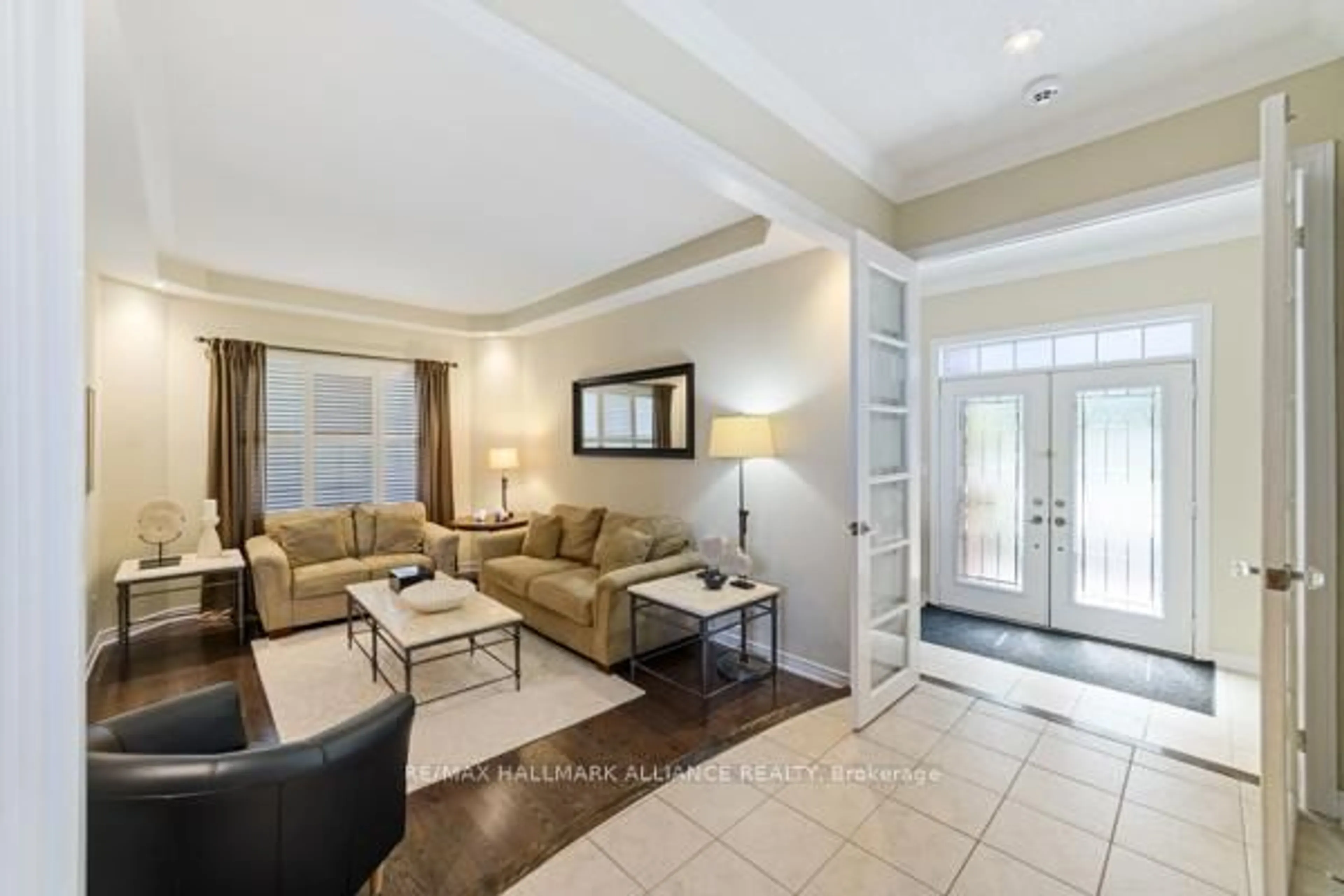 Living room with furniture, ceramic/tile floor for 2431 Meadowridge Dr, Oakville Ontario L6H 7R3