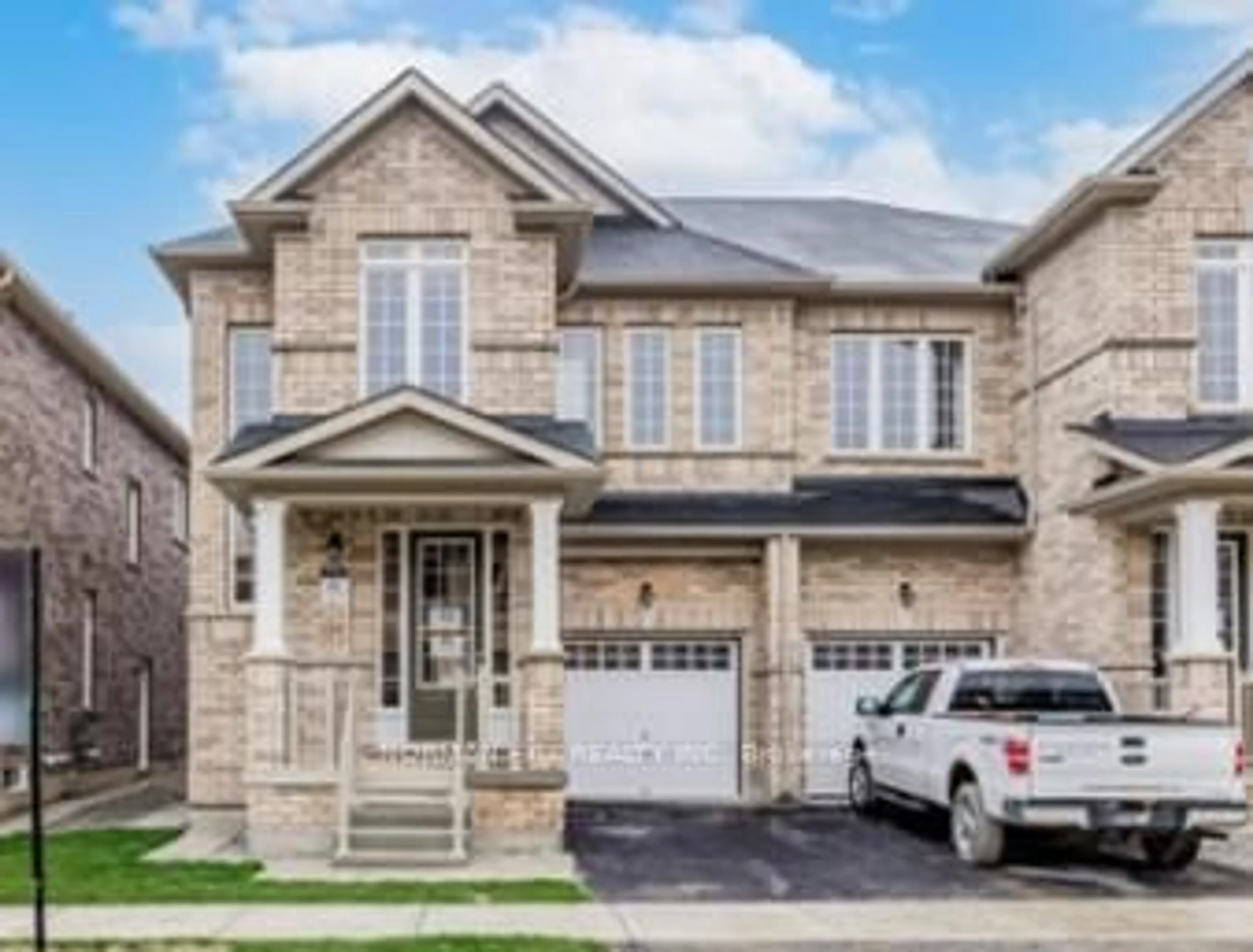 Home with brick exterior material, street for 18 Guildhouse Dr, Brampton Ontario L7A 4W5