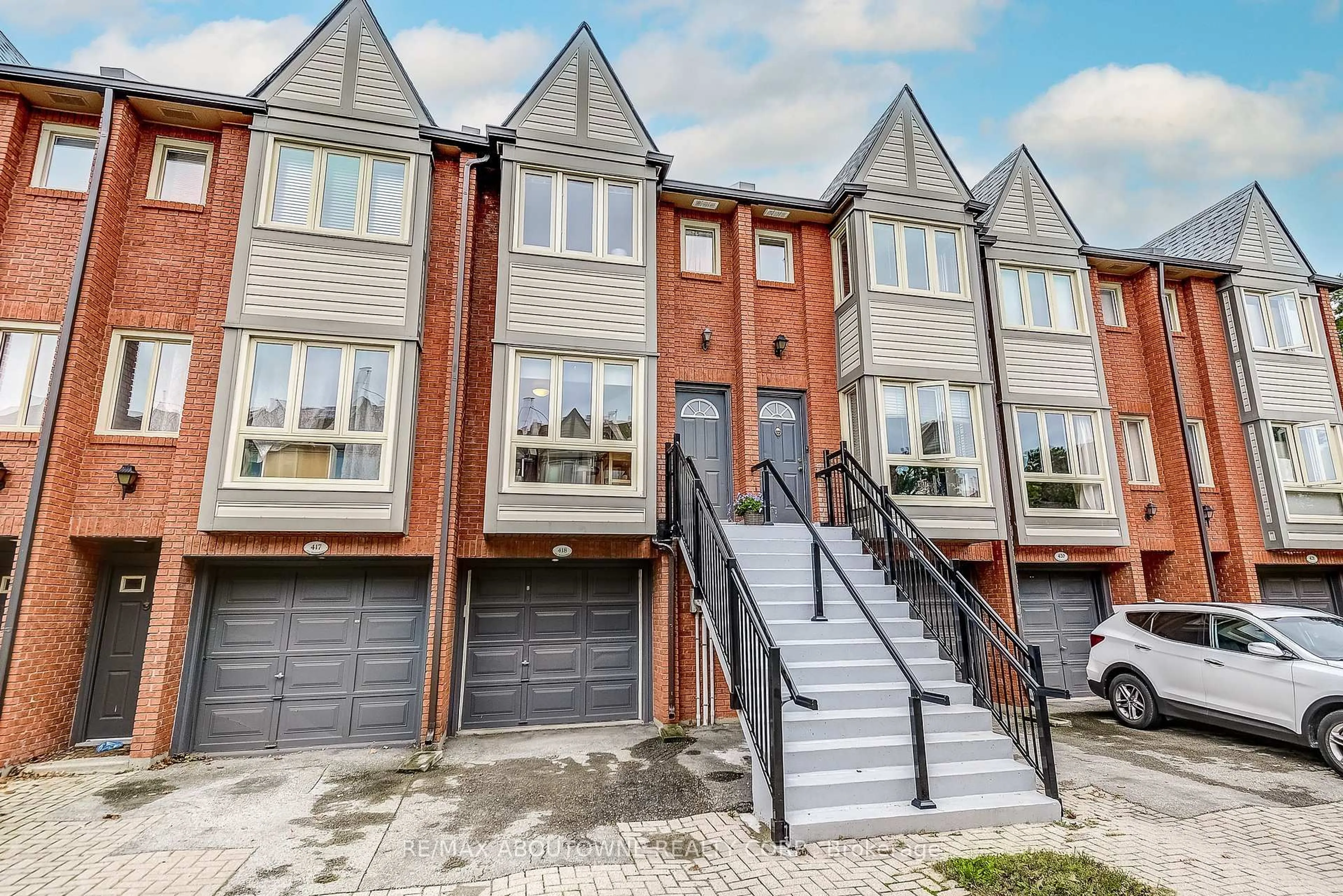 Home with brick exterior material, street for 895 Maple Ave #418, Burlington Ontario L7S 2H7