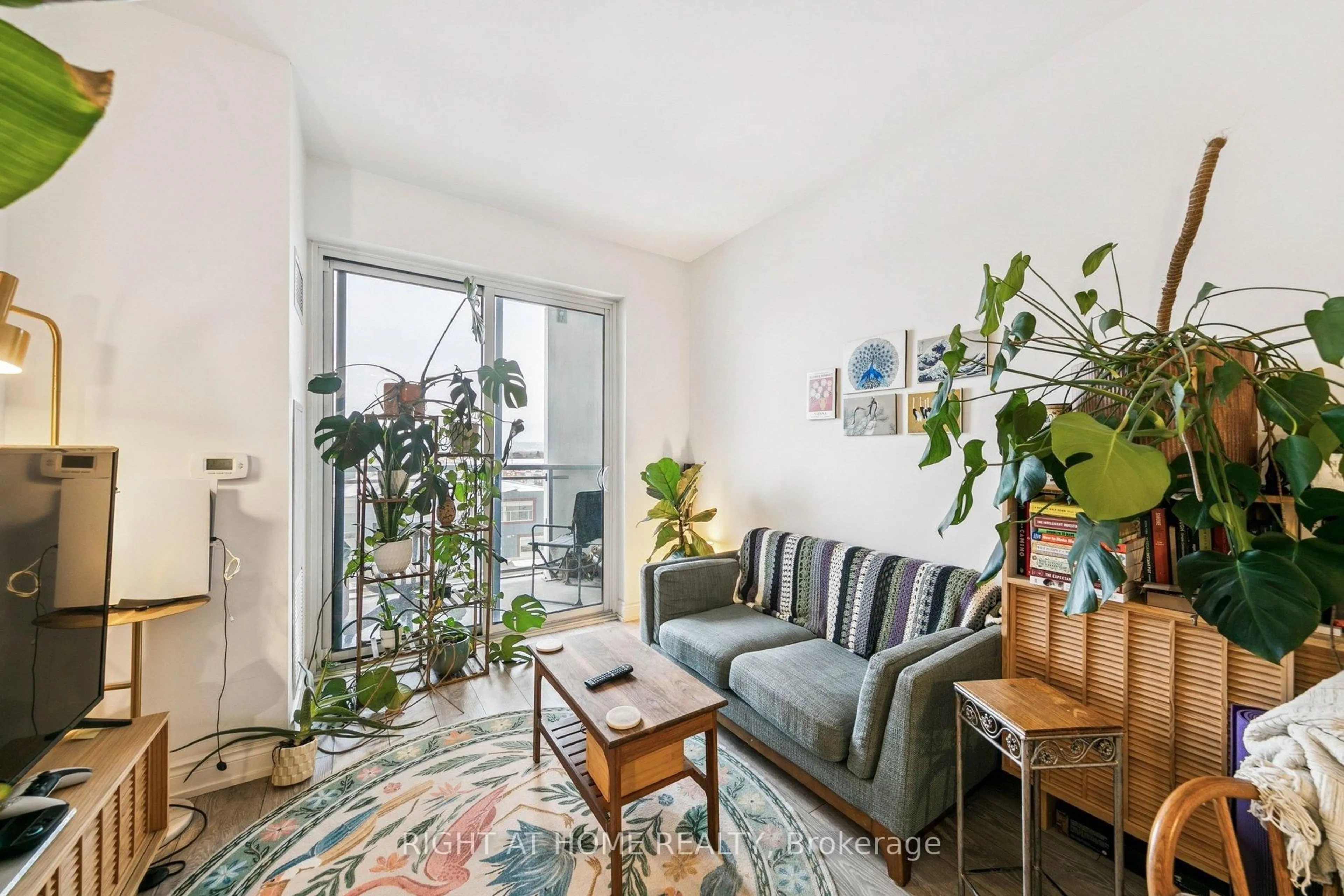 Living room with furniture, unknown for 1050 Main St Estates #501, Milton Ontario L9T 9M3