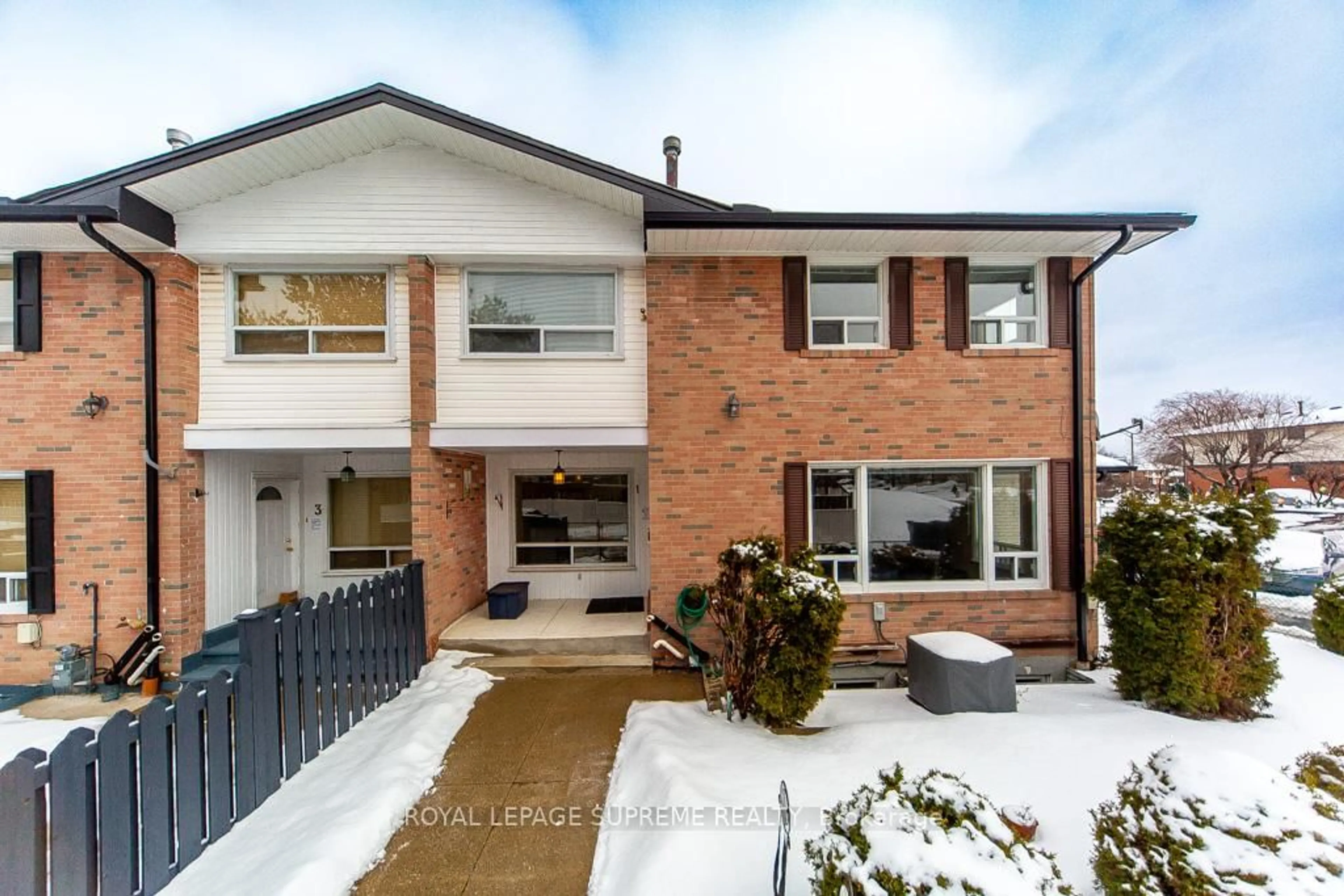 Home with brick exterior material, street for 61 Ardglen Dr #1, Brampton Ontario L6W 1V1