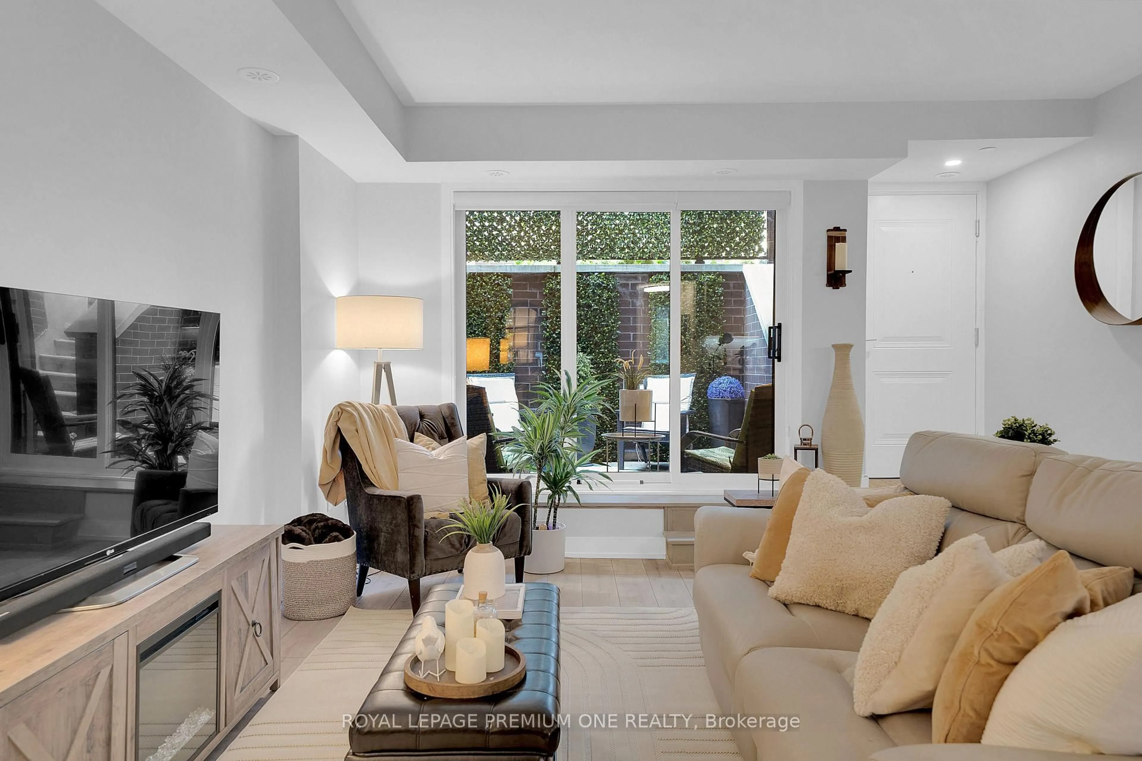 Living room with furniture, ceramic/tile floor for 66 Long Branch Ave #13, Toronto Ontario M8W 3J4