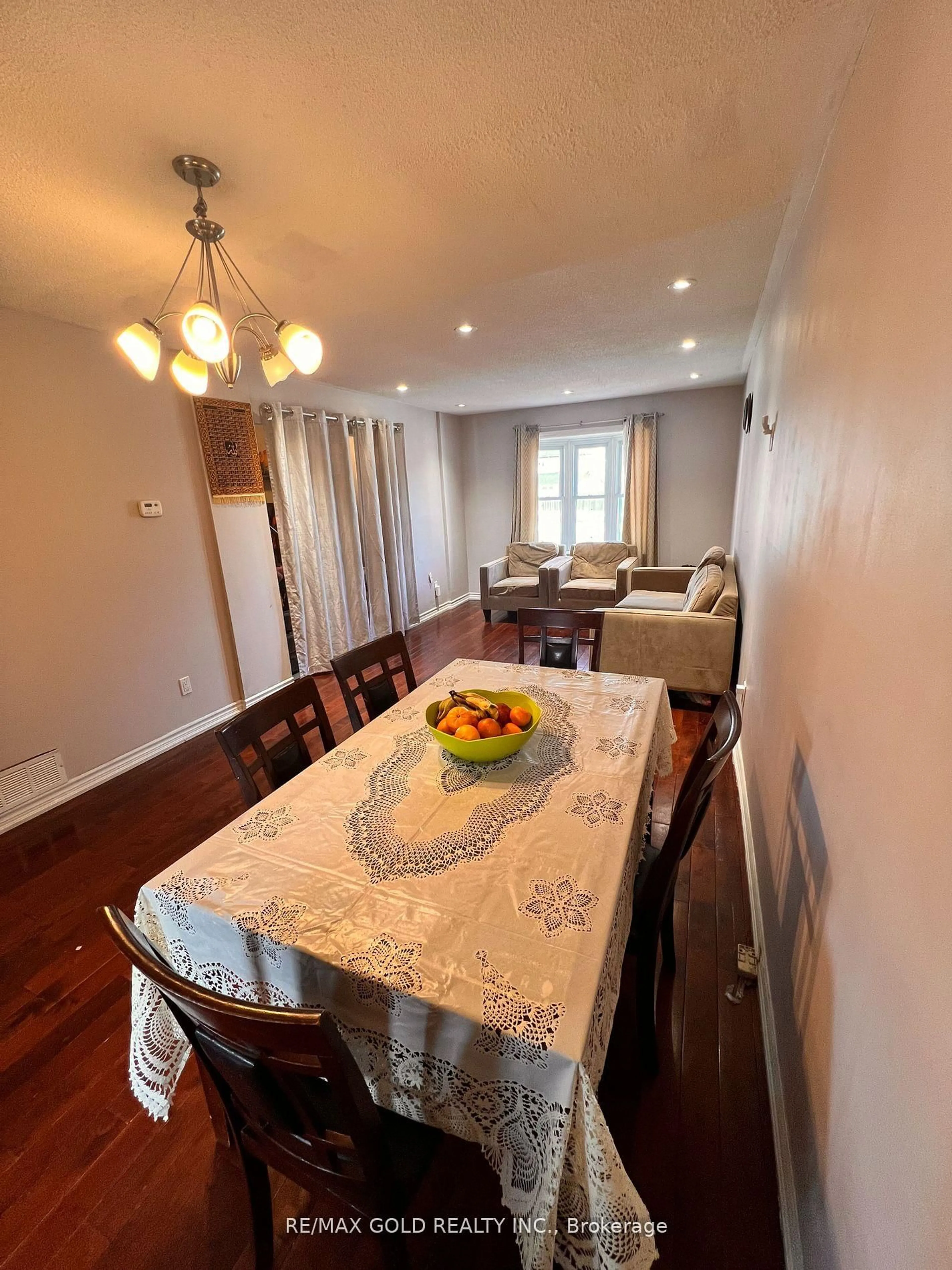 Dining room, wood/laminate floor for 1020 Central Park Dr #5, Brampton Ontario L6S 3J5