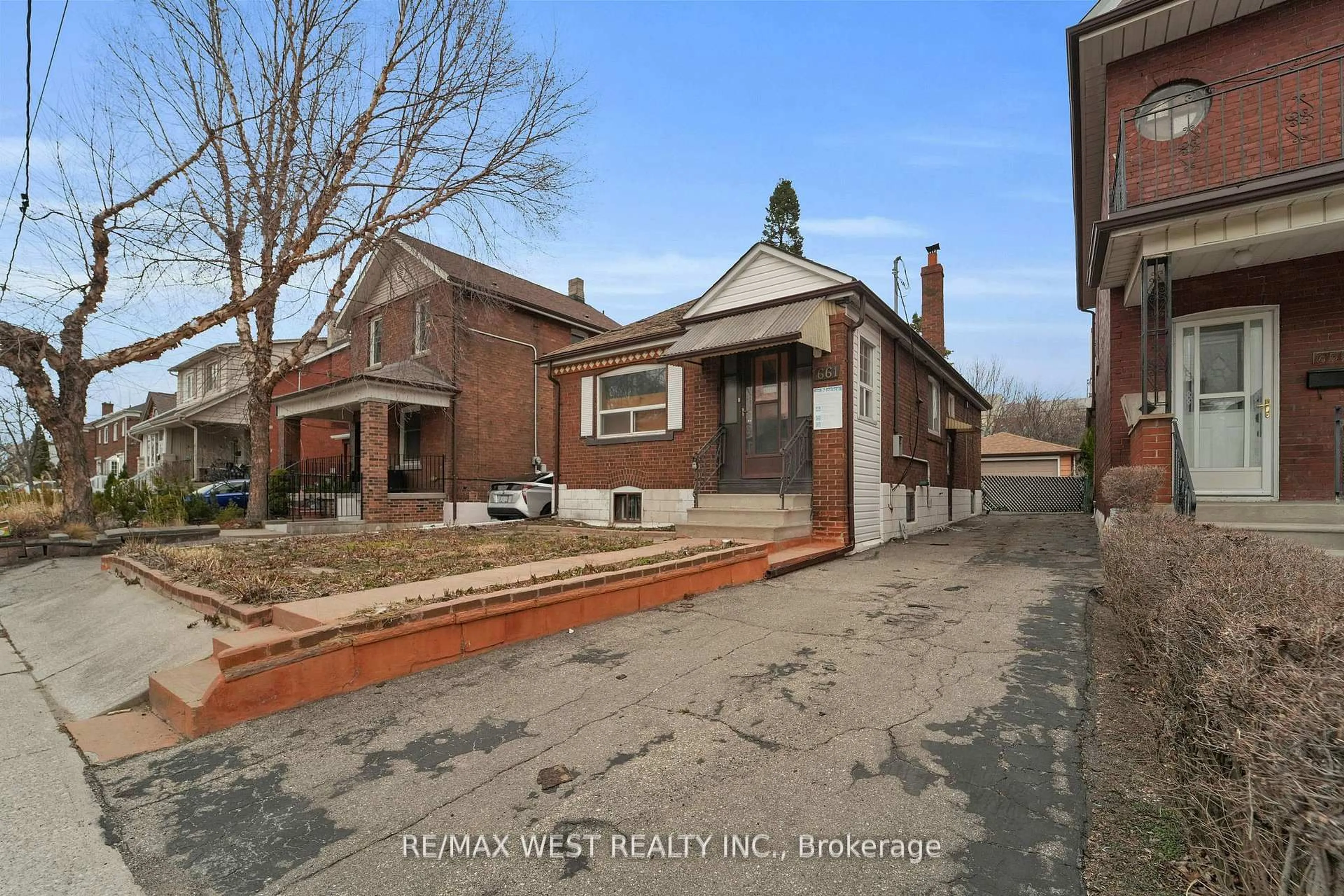 Home with brick exterior material, street for 661 Beresford Ave, Toronto Ontario M6S 3C4