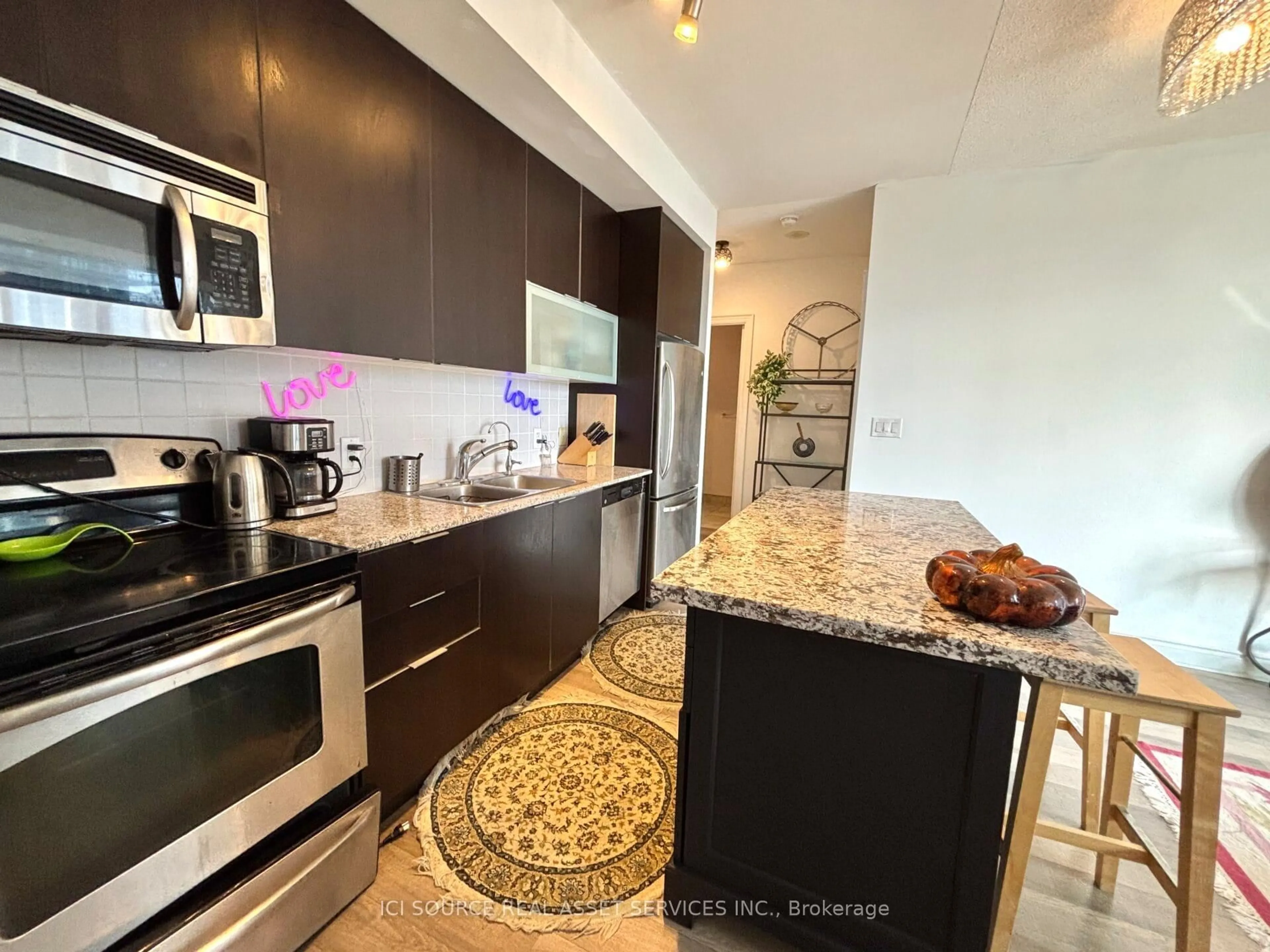 Open concept kitchen, ceramic/tile floor for 16 Brookers Lane #3008, Toronto Ontario M8V 0A5