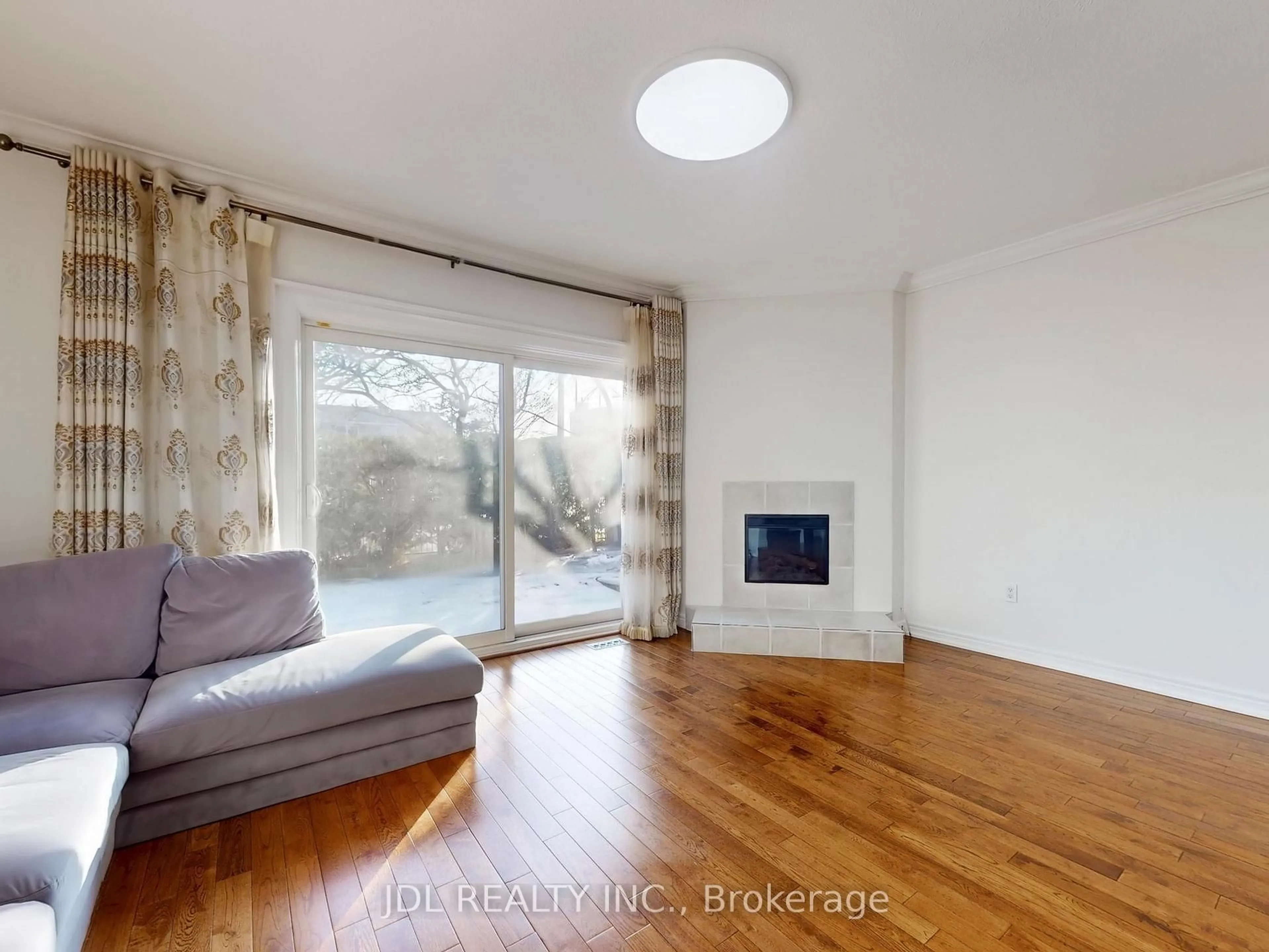 Living room with furniture, wood/laminate floor for 2205 South Millway #112, Mississauga Ontario L5L 3T2