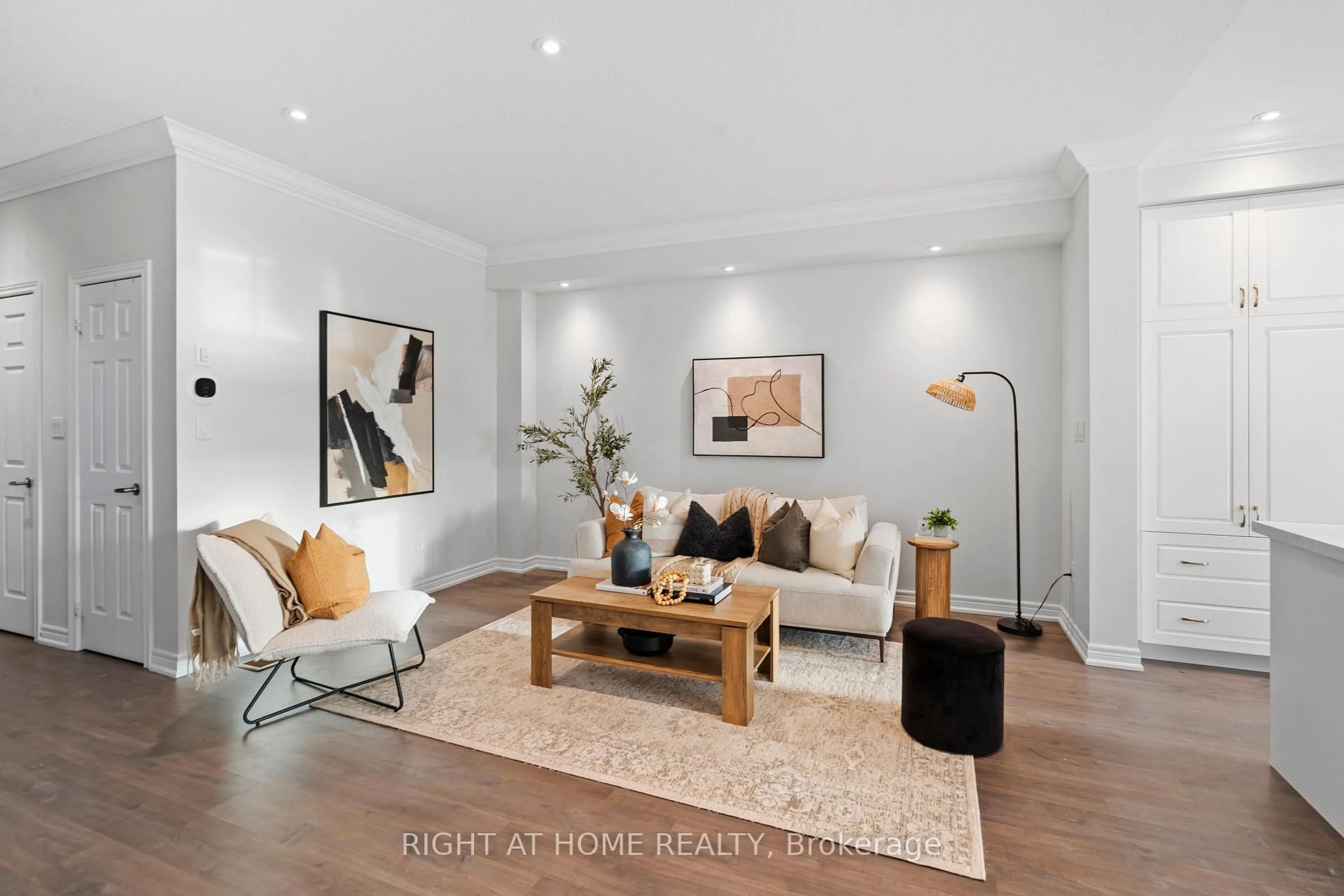Living room with furniture, wood/laminate floor for 16 Doris Pawley Cres, Caledon Ontario L7C 4E7