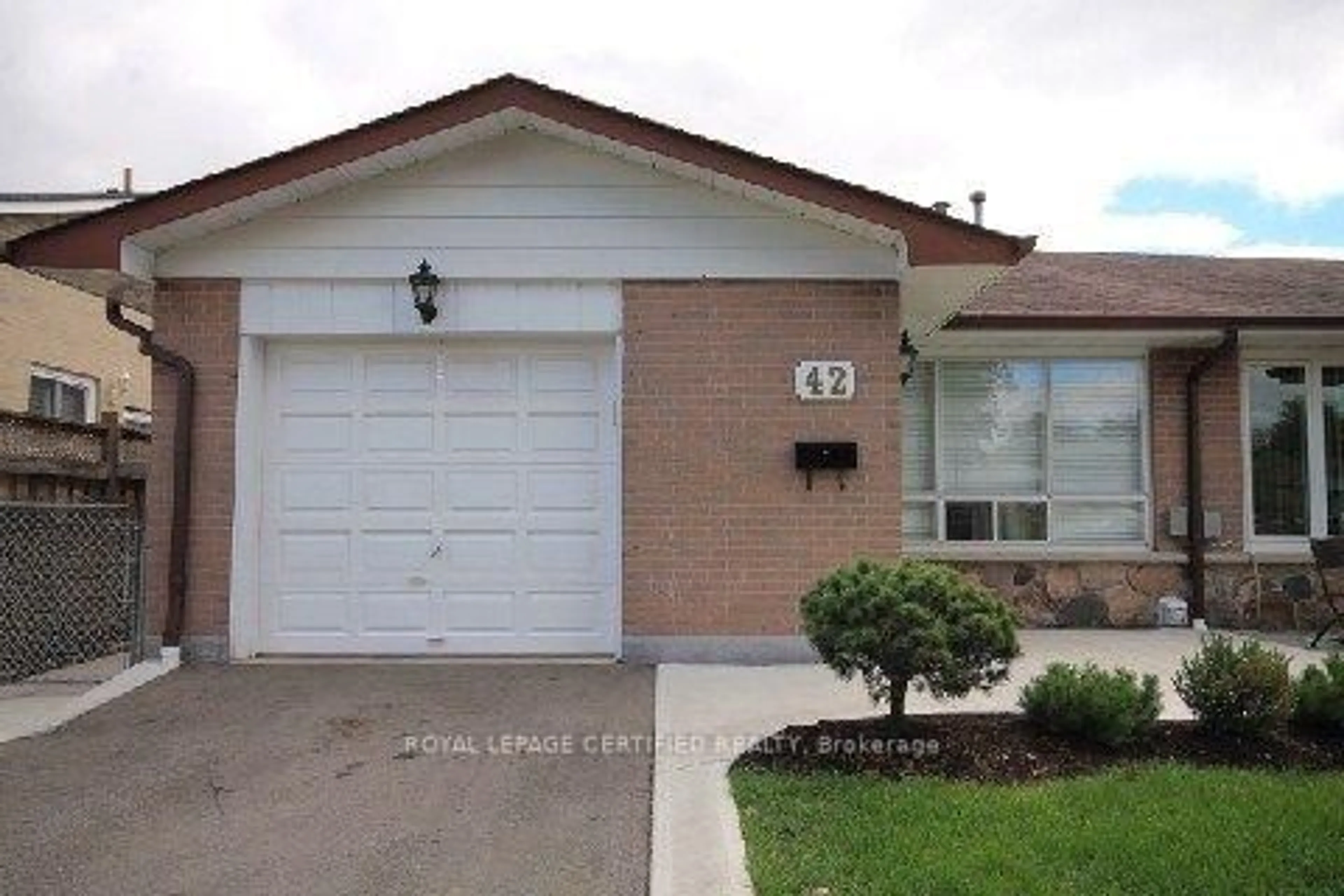 Home with brick exterior material, street for 42 Wilton Dr, Brampton Ontario L6W 3A1