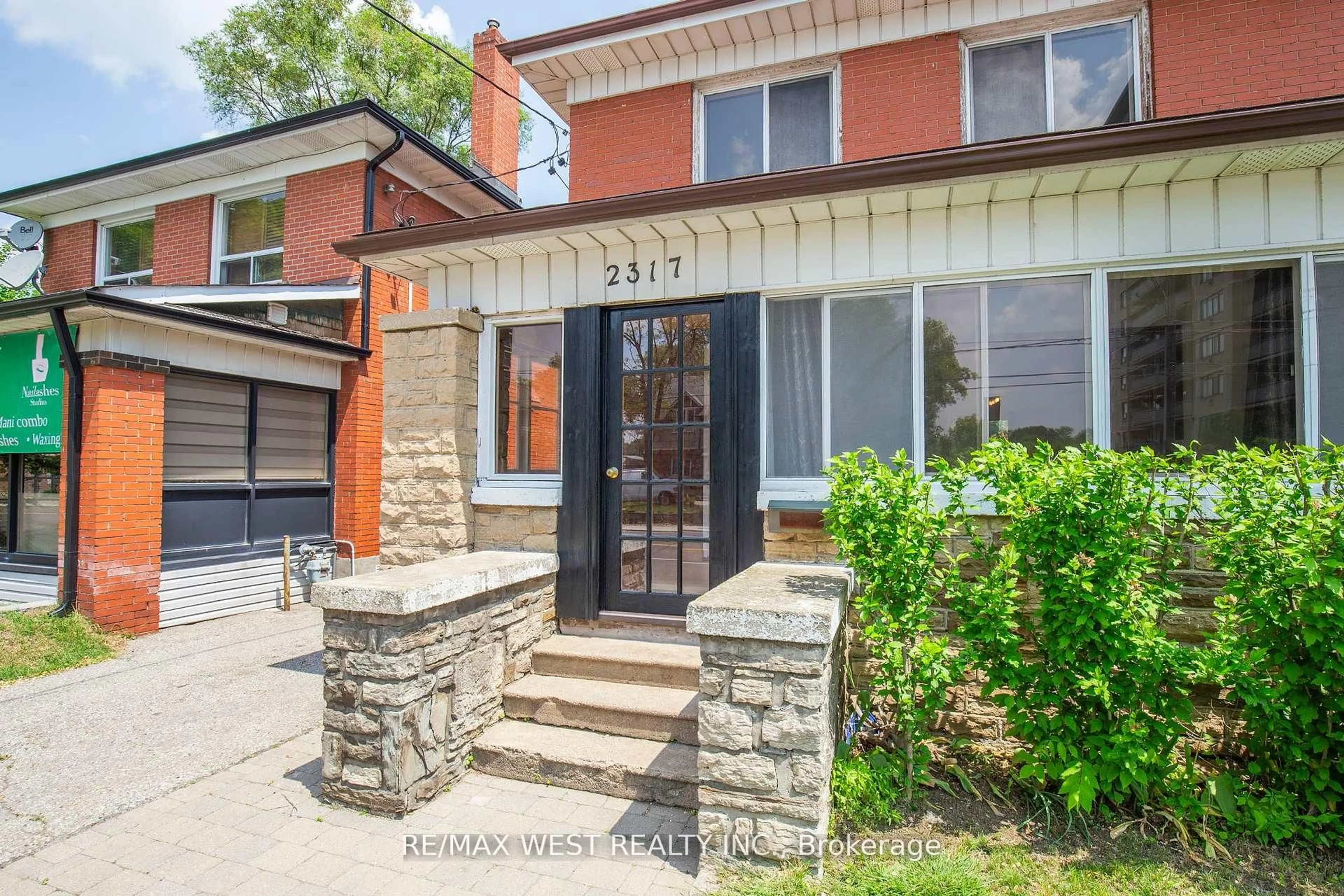 Home with brick exterior material, street for 2317 Weston Rd, Toronto Ontario M9N 1Z7