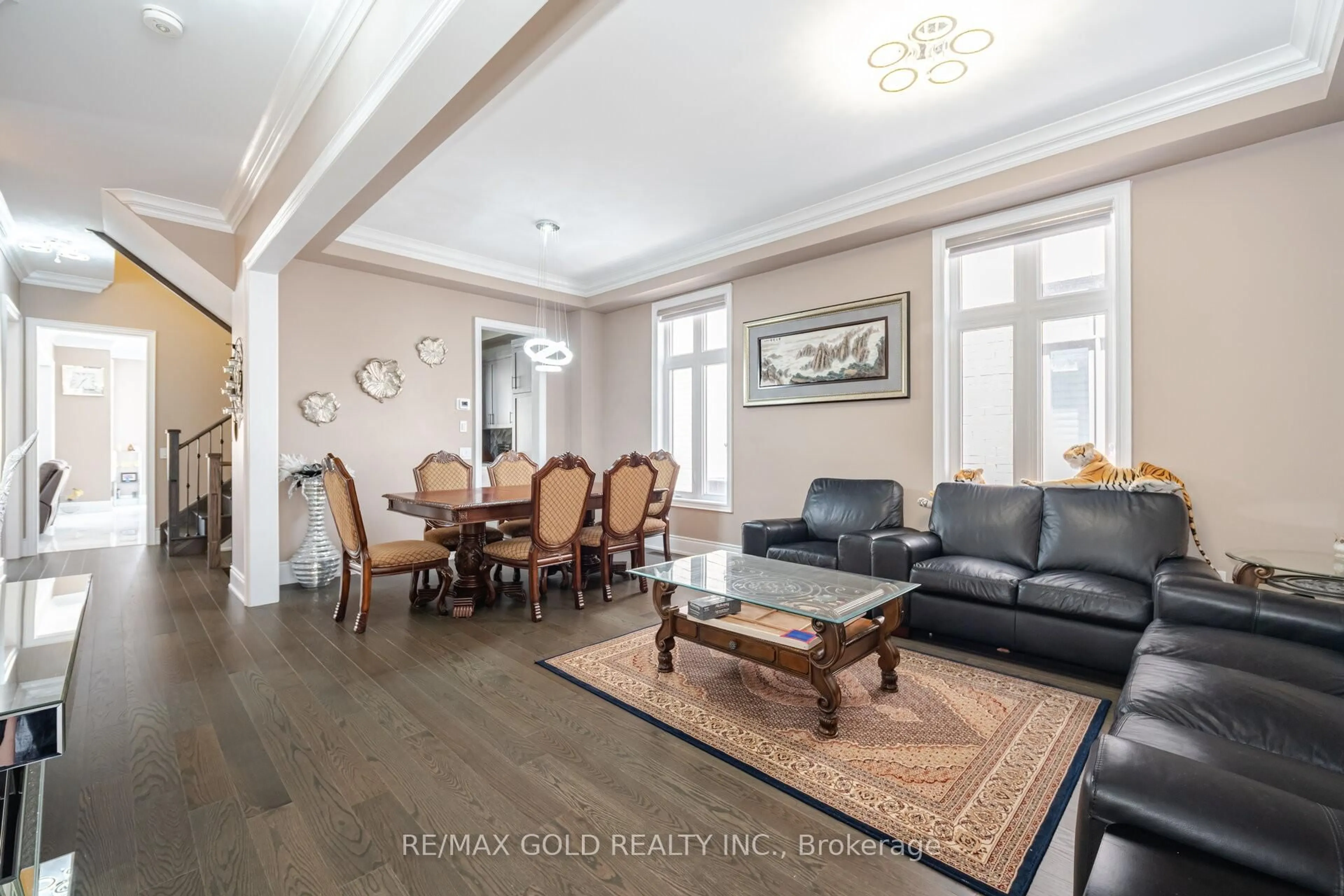 Living room with furniture, wood/laminate floor for 85 James Walker Ave, Caledon Ontario L7C 4N1