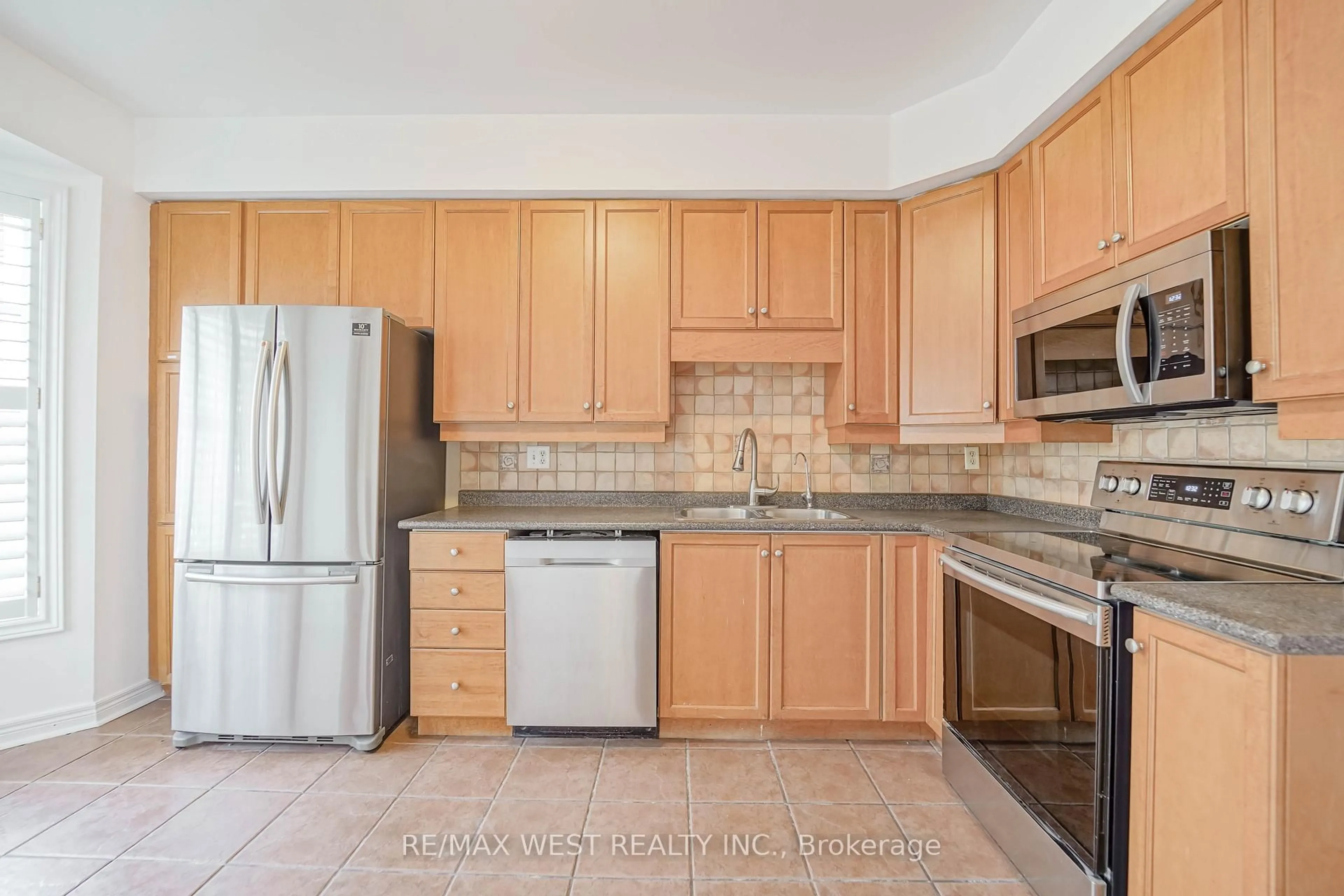 Standard kitchen, ceramic/tile floor for 8 James Stock Path #36, Toronto Ontario M8Z 6C6