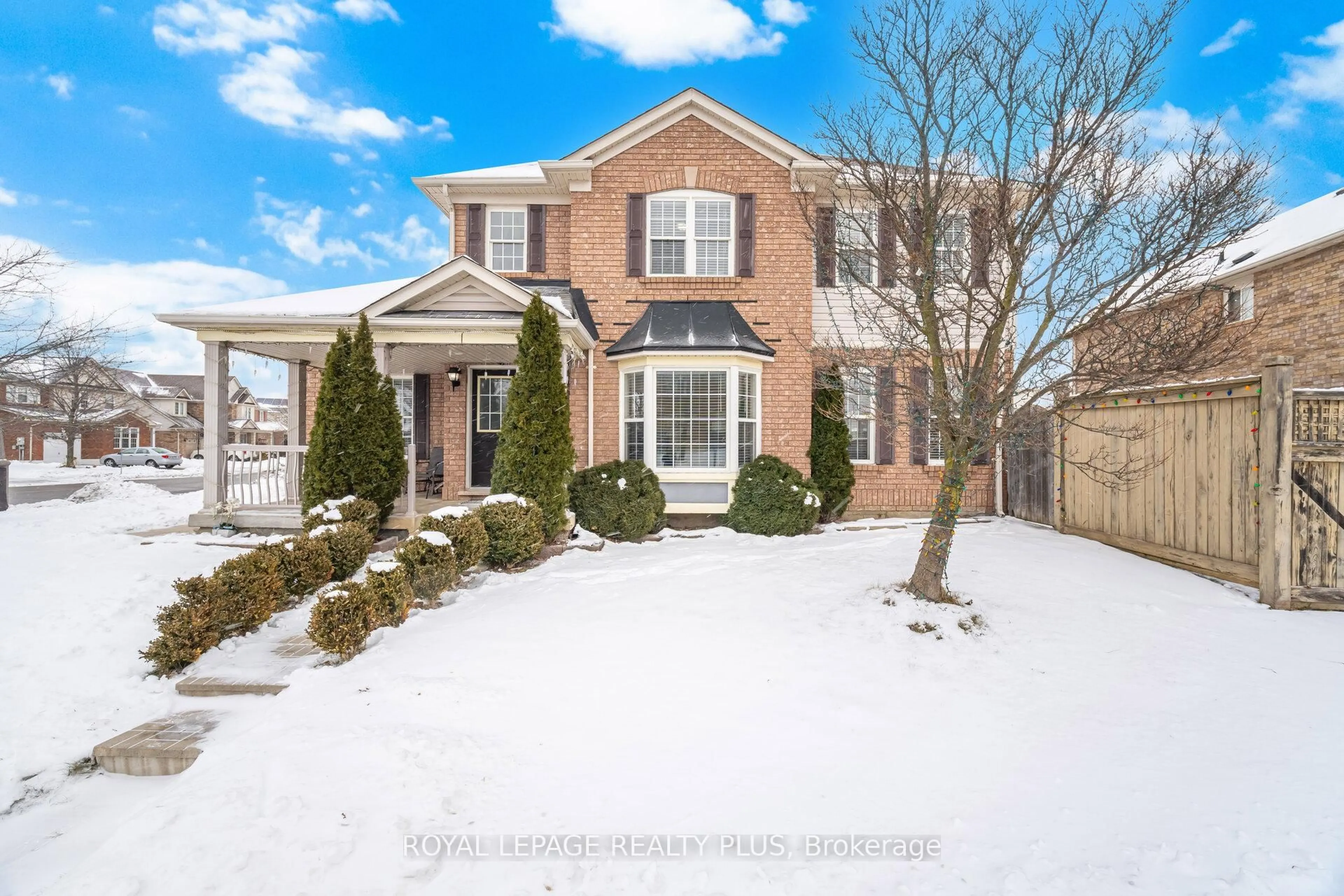 Home with brick exterior material, street for 387 Brisdale Dr, Brampton Ontario L7A 3K7