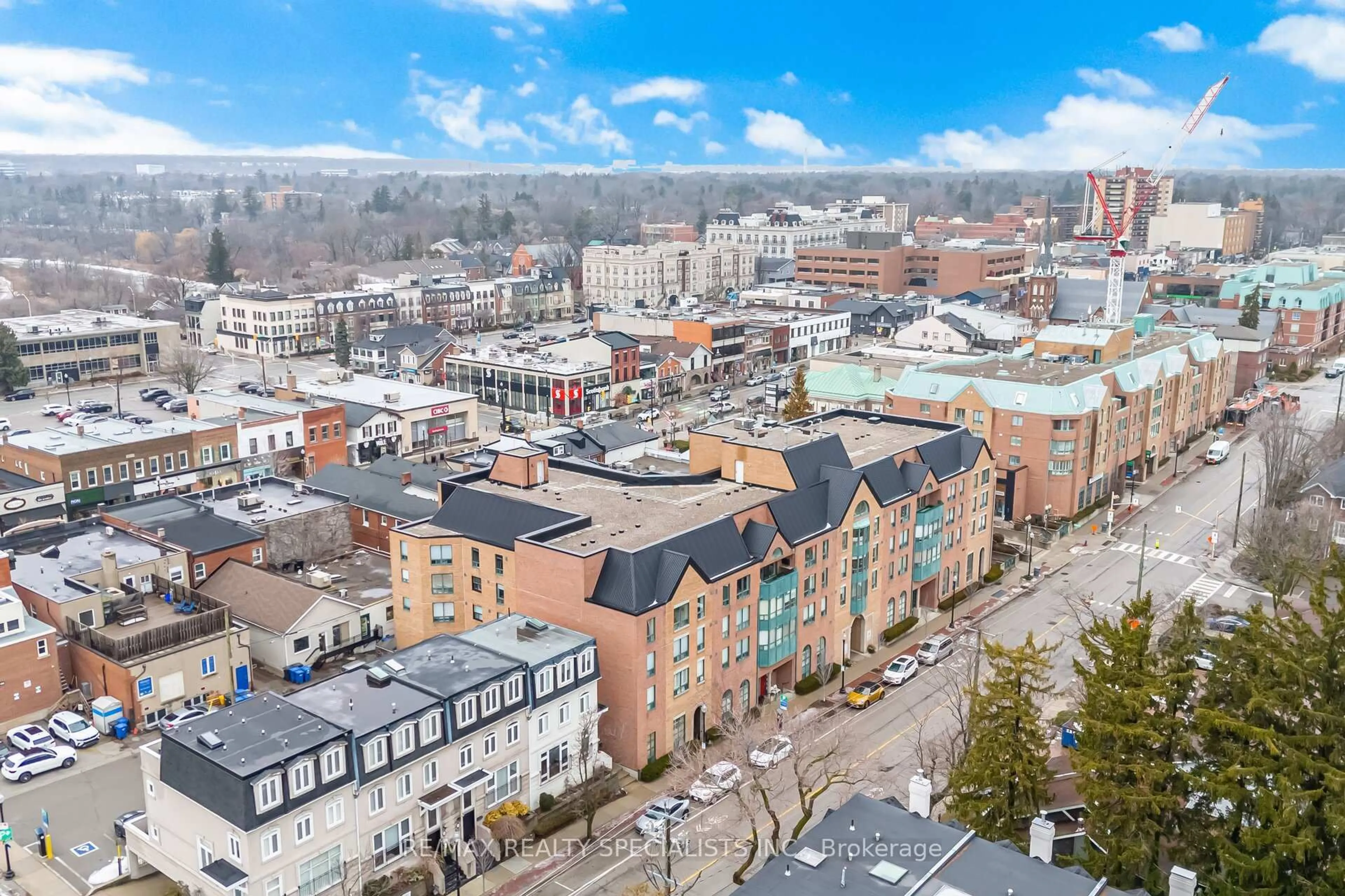A pic from outside/outdoor area/front of a property/back of a property/a pic from drone, city buildings view from balcony for 185 Robinson St #304, Oakville Ontario L6J 7P6