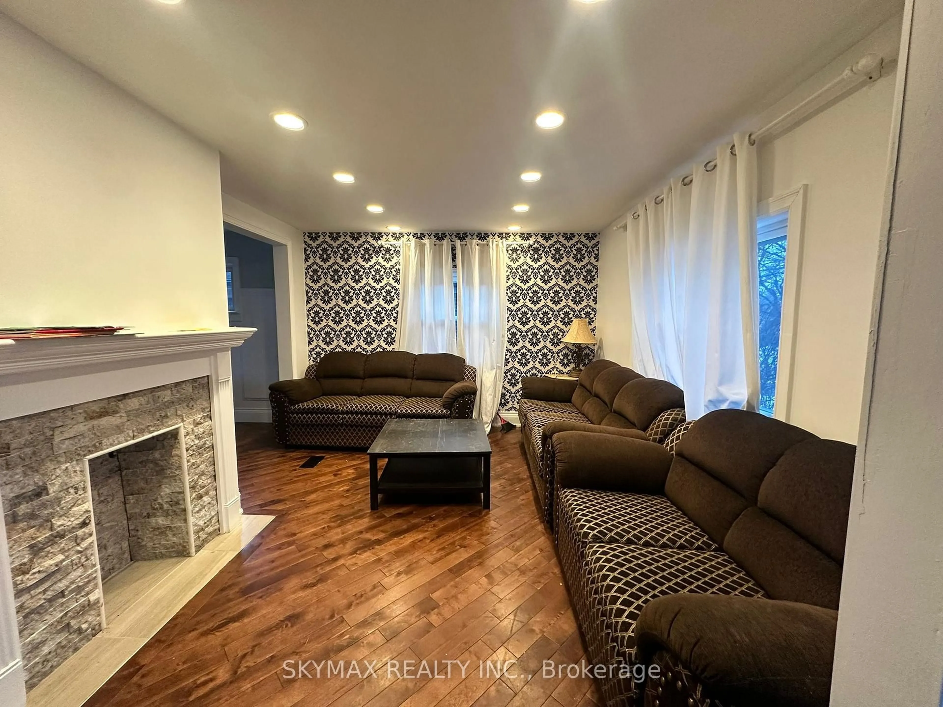 Living room with furniture, unknown for 15 College St, Toronto Ontario M9V 1H4