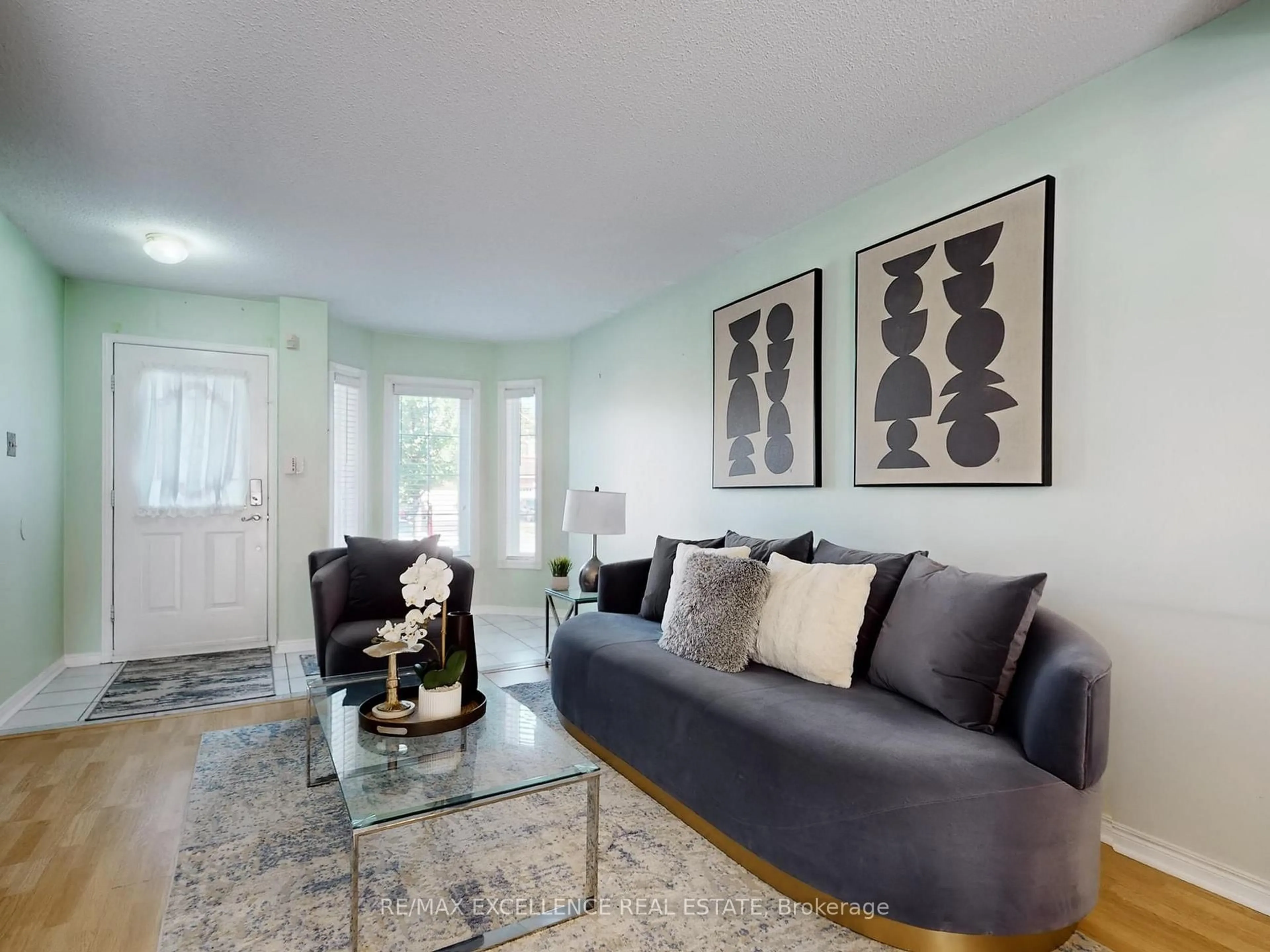 Living room with furniture, unknown for 23 Arthurs Cres, Brampton Ontario L6Y 4Y2