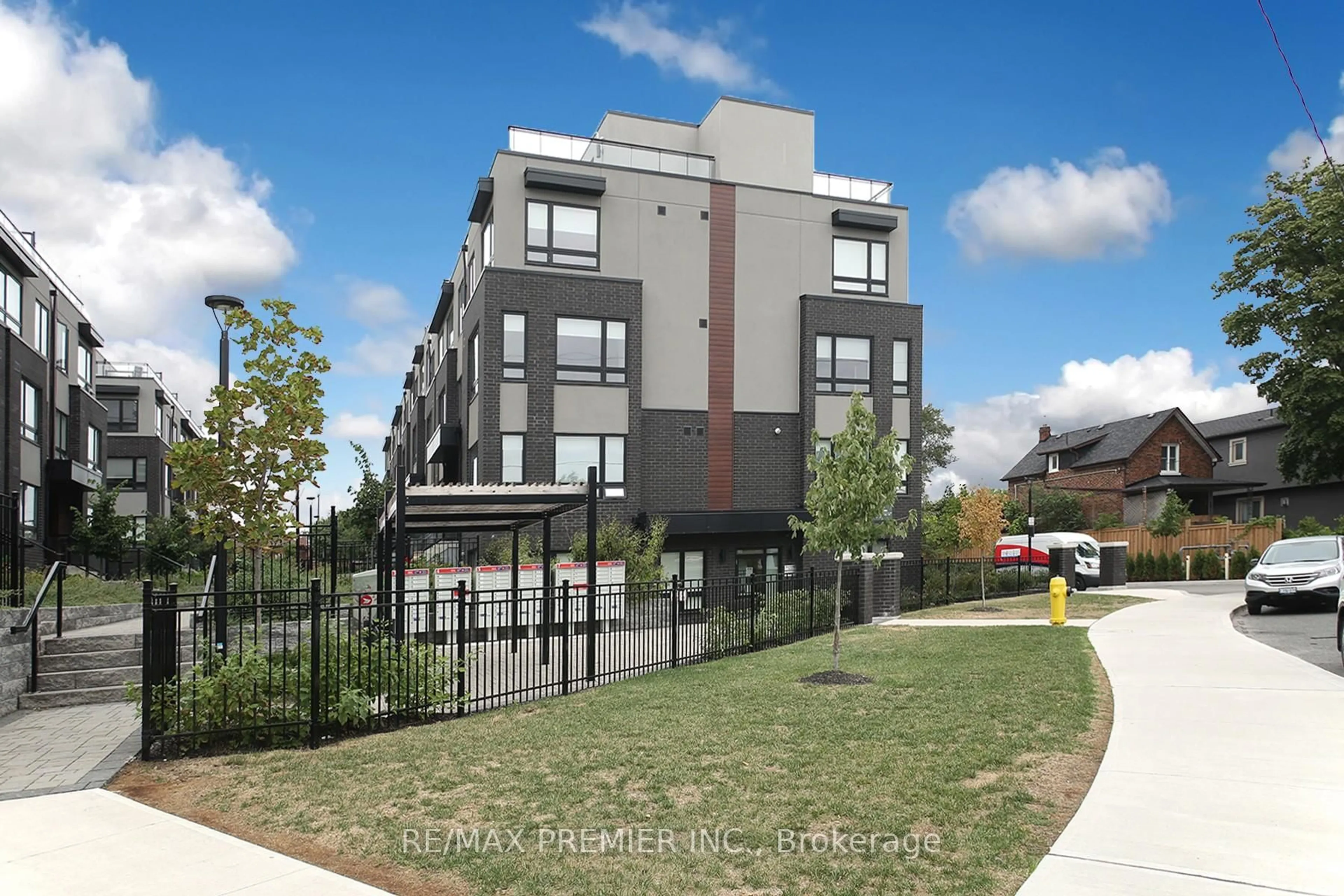 A pic from outside/outdoor area/front of a property/back of a property/a pic from drone, street for 1100 Briar Hill Ave #312, Toronto Ontario M6B 0A9