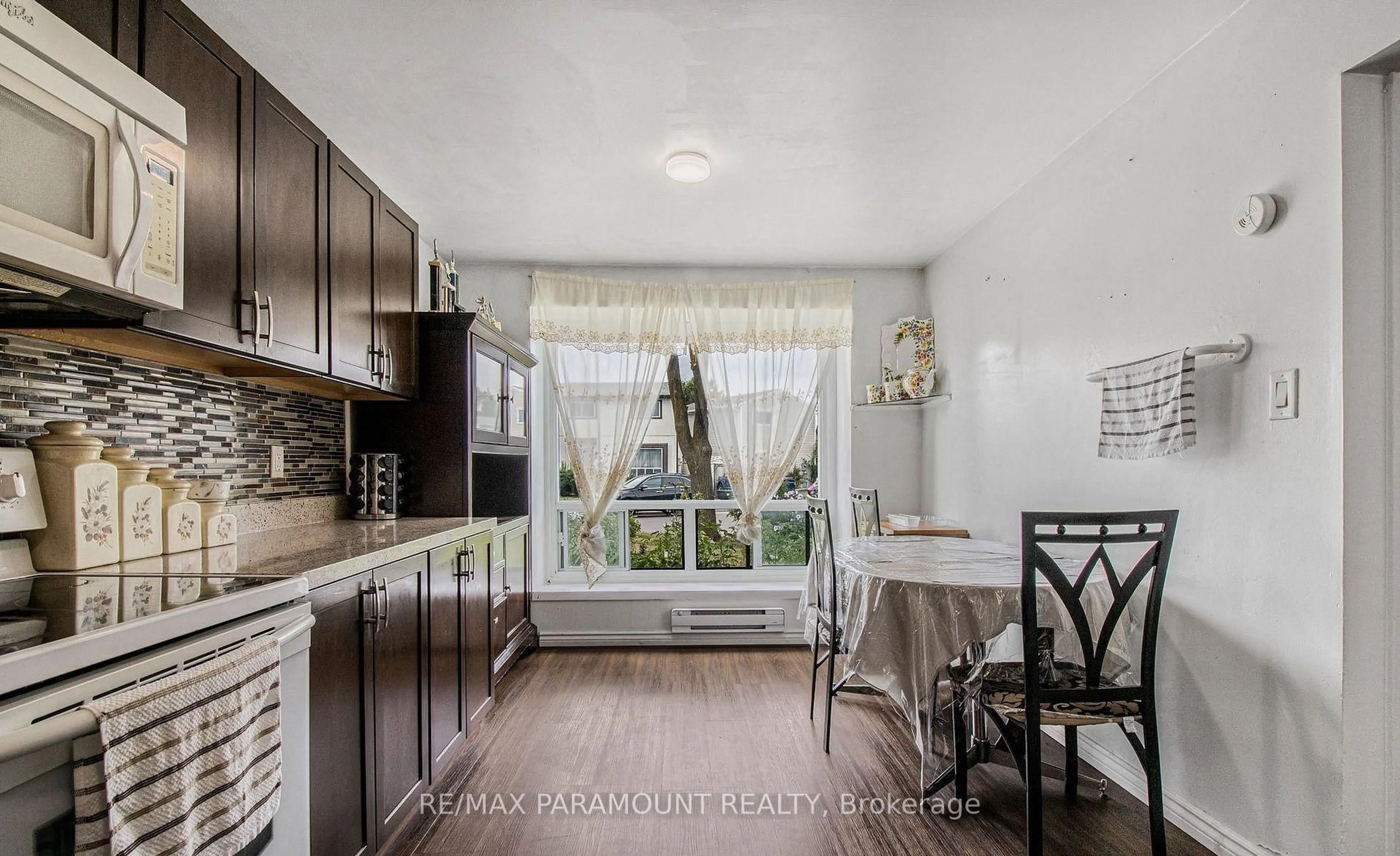 Open concept kitchen, unknown for 95 Huntingwood Cres, Brampton Ontario L6S 1S5