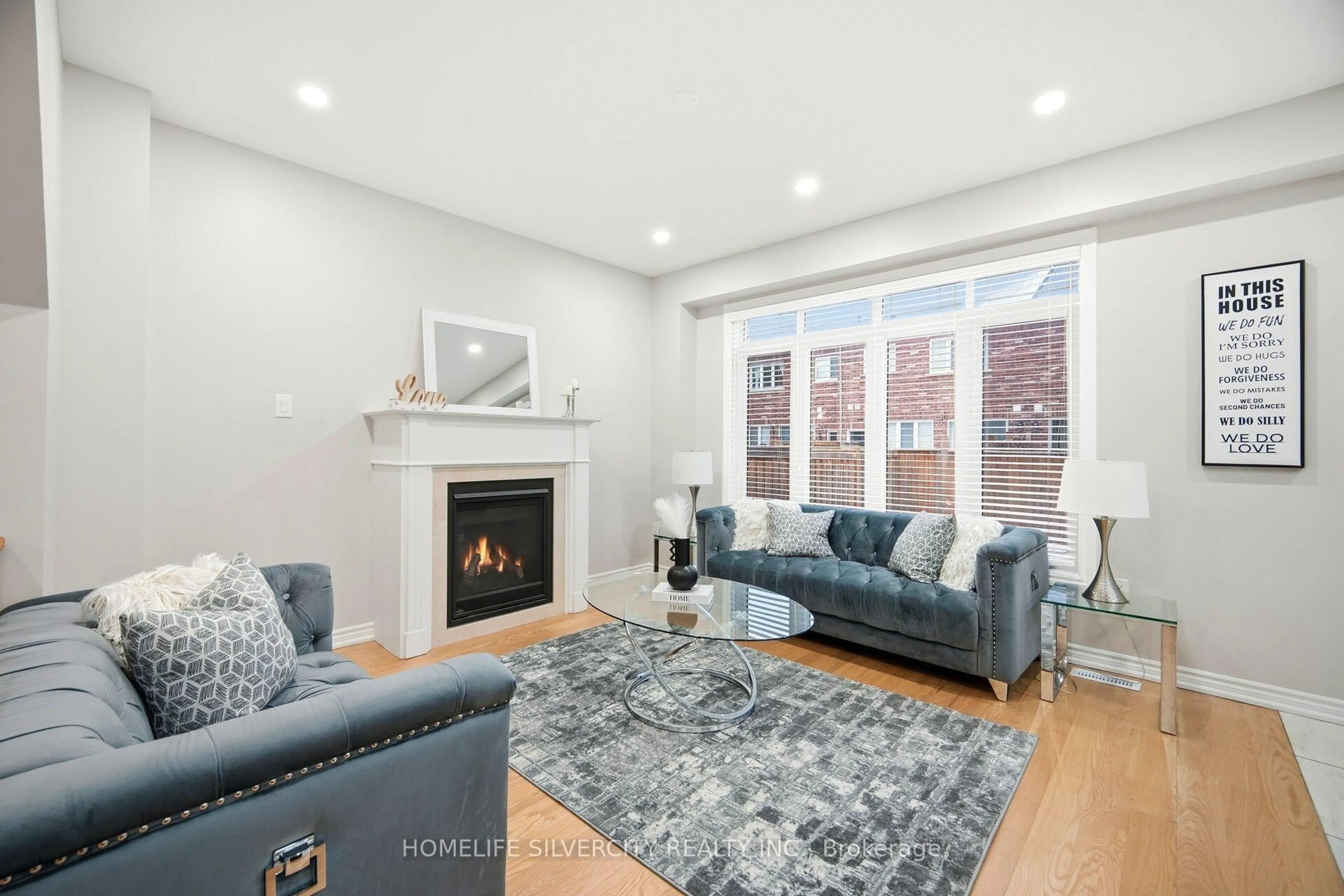 Living room with furniture, unknown for 28 Dolobram Tr, Brampton Ontario L4A 4Y1