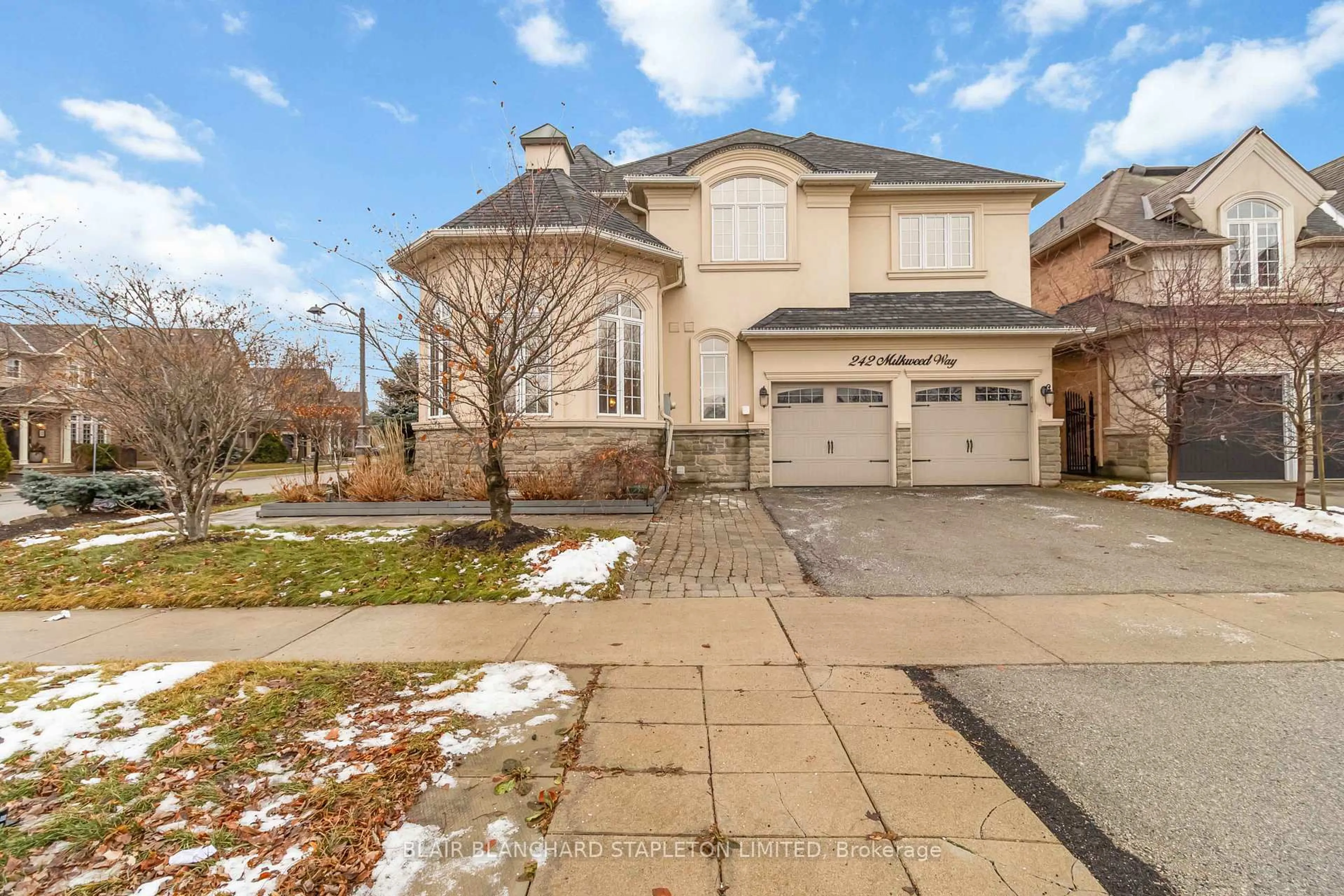 Home with brick exterior material, street for 242 Milkweed Way, Oakville Ontario L6L 0A6