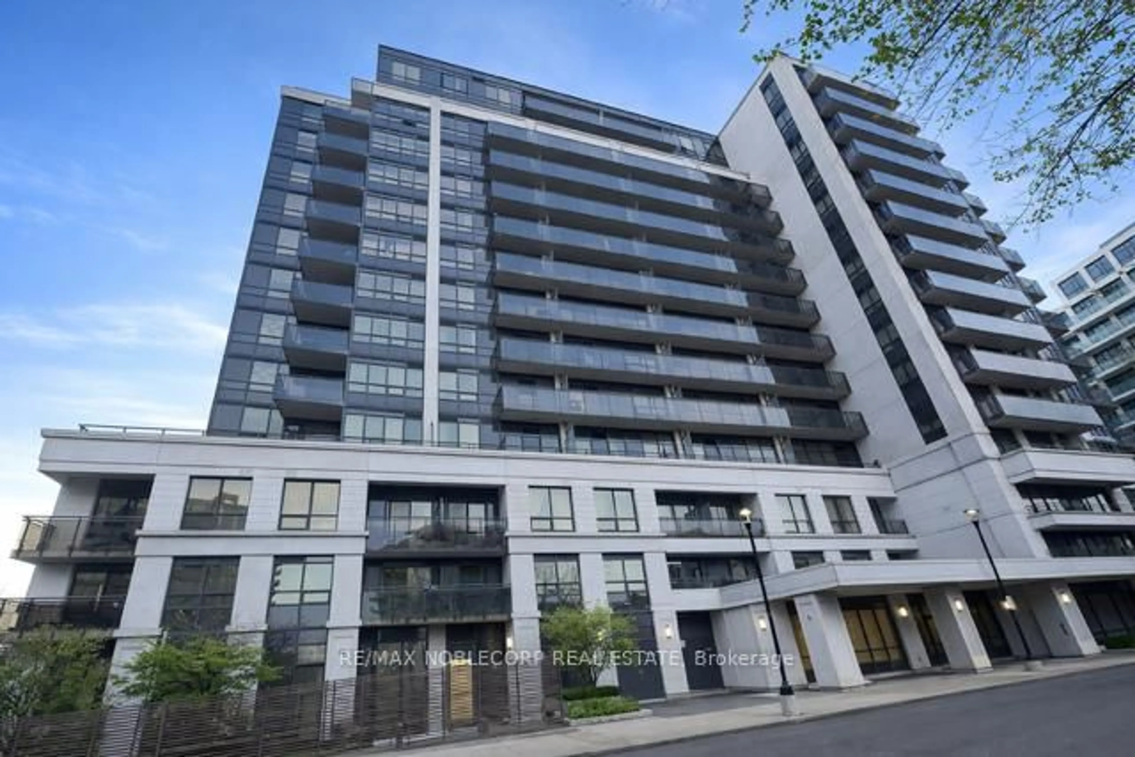 A pic from outside/outdoor area/front of a property/back of a property/a pic from drone, building for 55 De Boers Dr #506, Toronto Ontario M3J 0G5