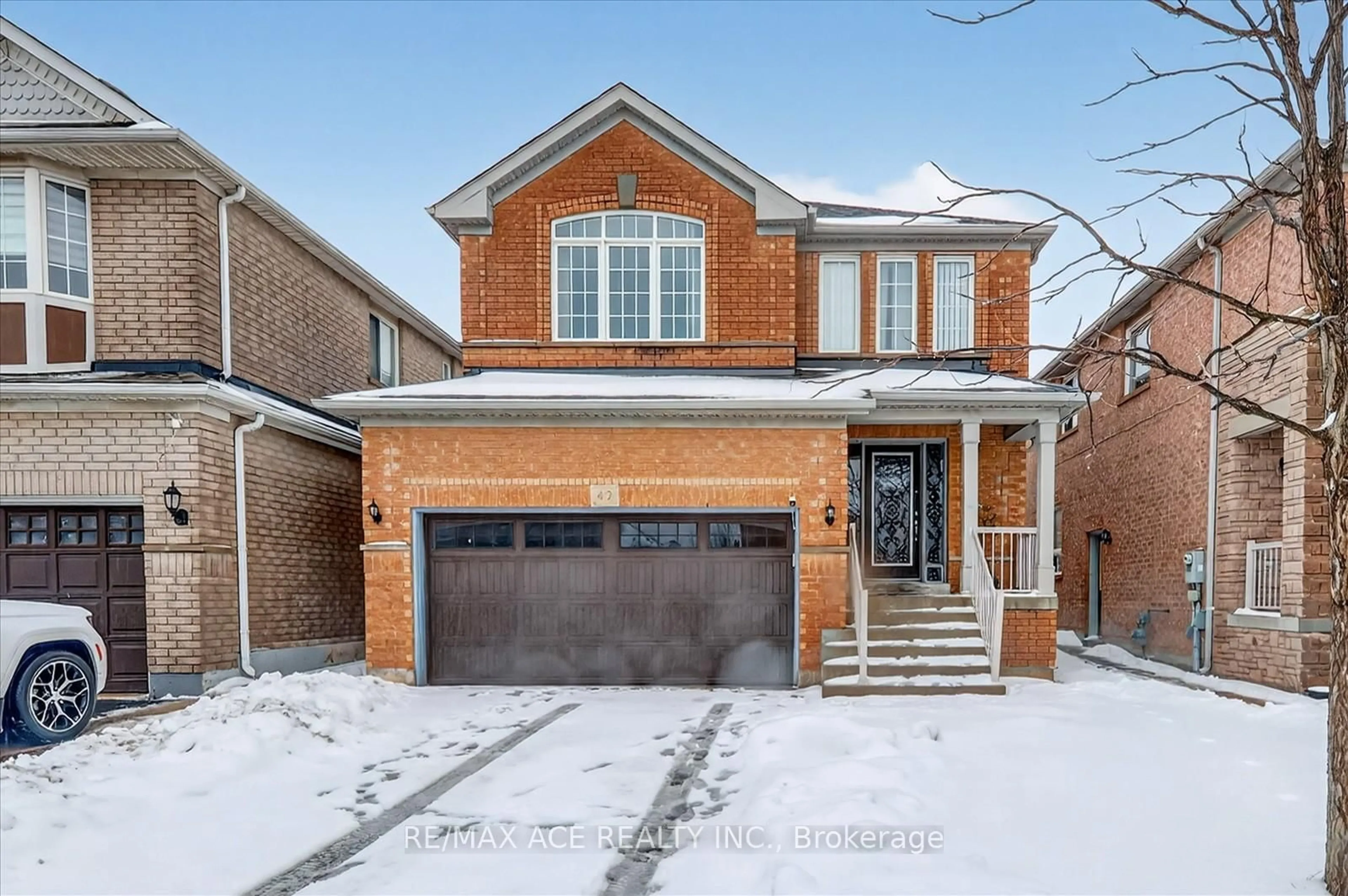Home with brick exterior material, street for 42 Feather Reed Way, Brampton Ontario L6R 3A3