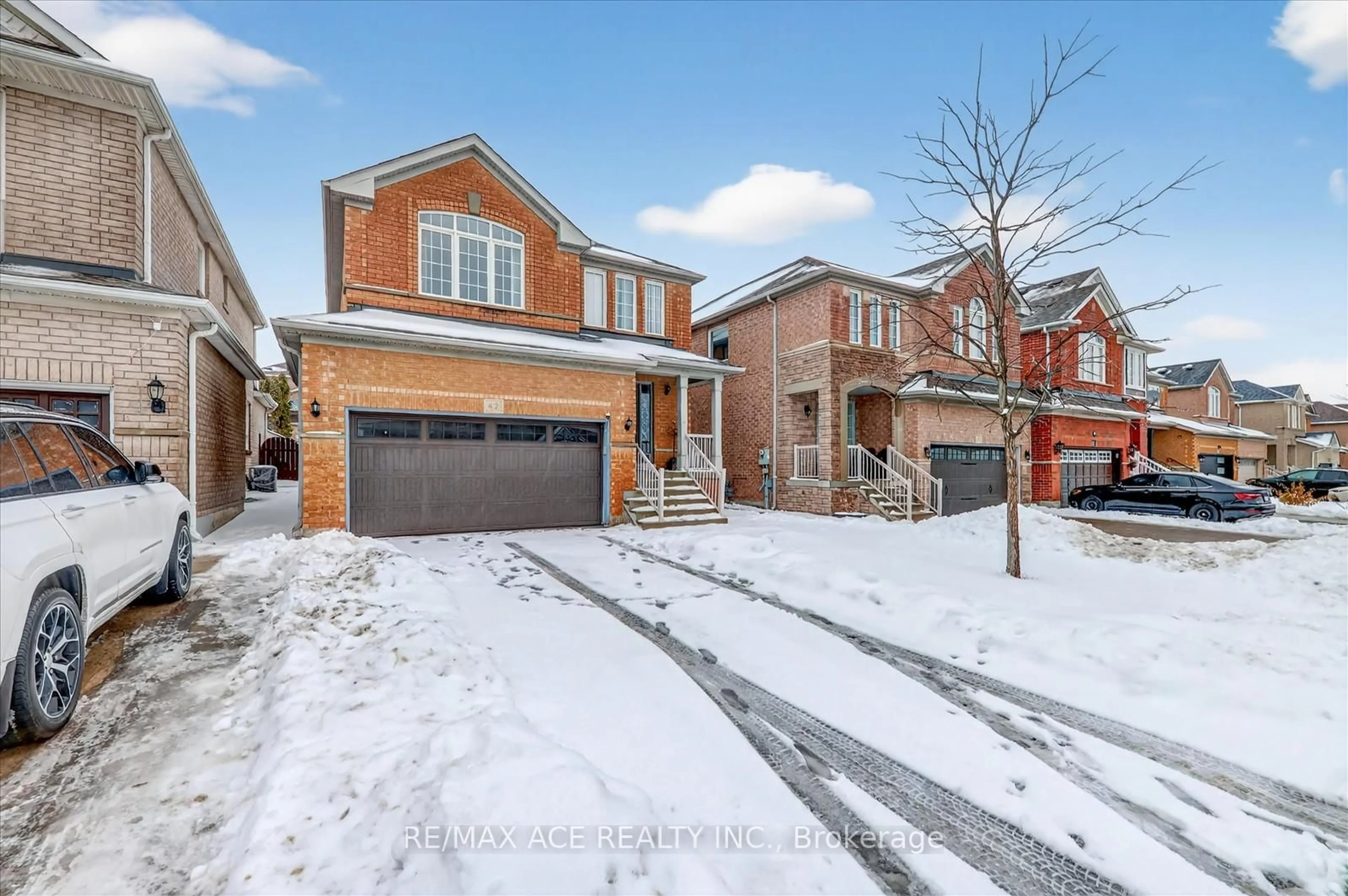 Home with brick exterior material, street for 42 Feather Reed Way, Brampton Ontario L6R 3A3