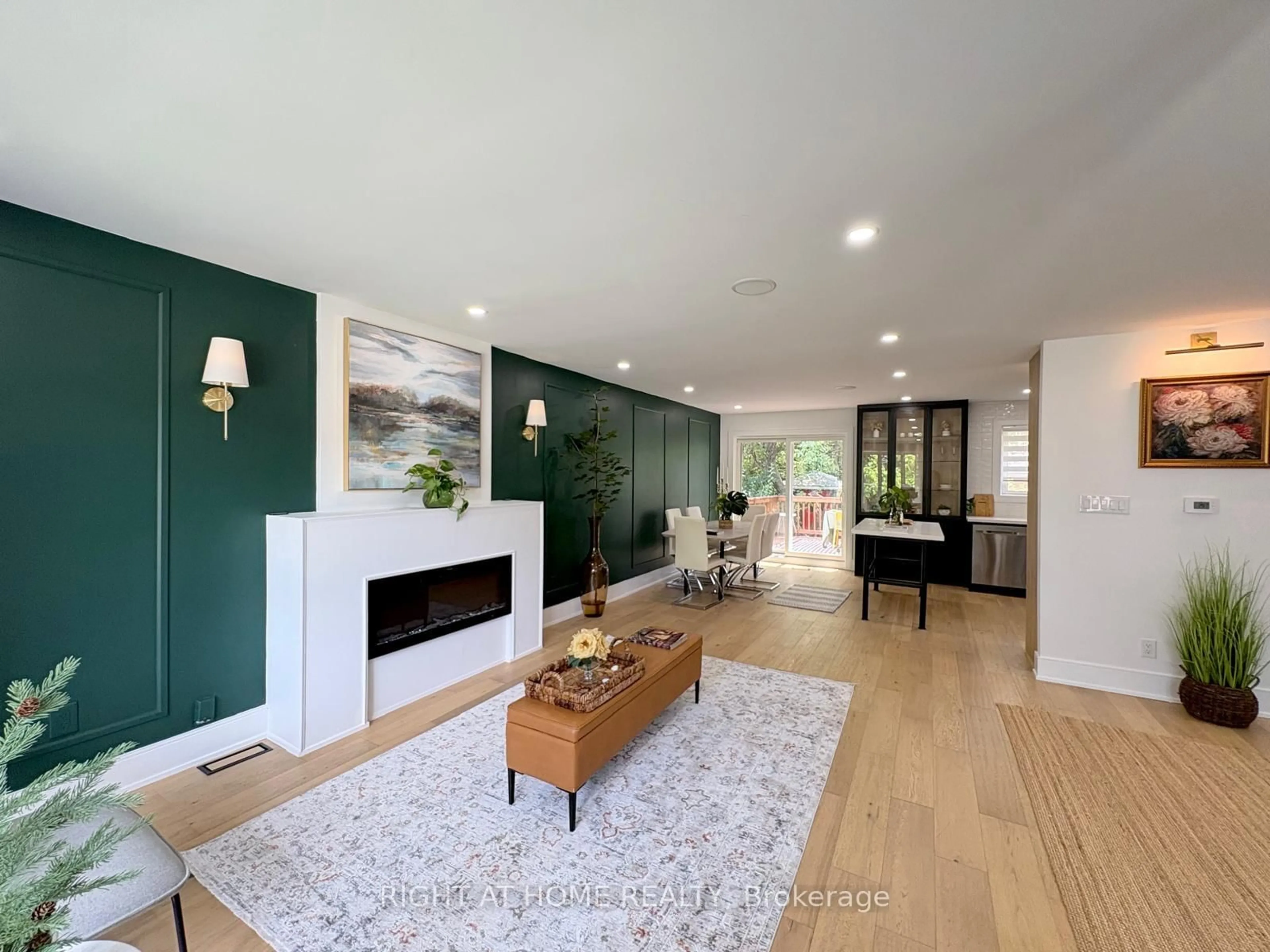 Living room with furniture, wood/laminate floor for 23 Drury Lane, Toronto Ontario M9P 1P8