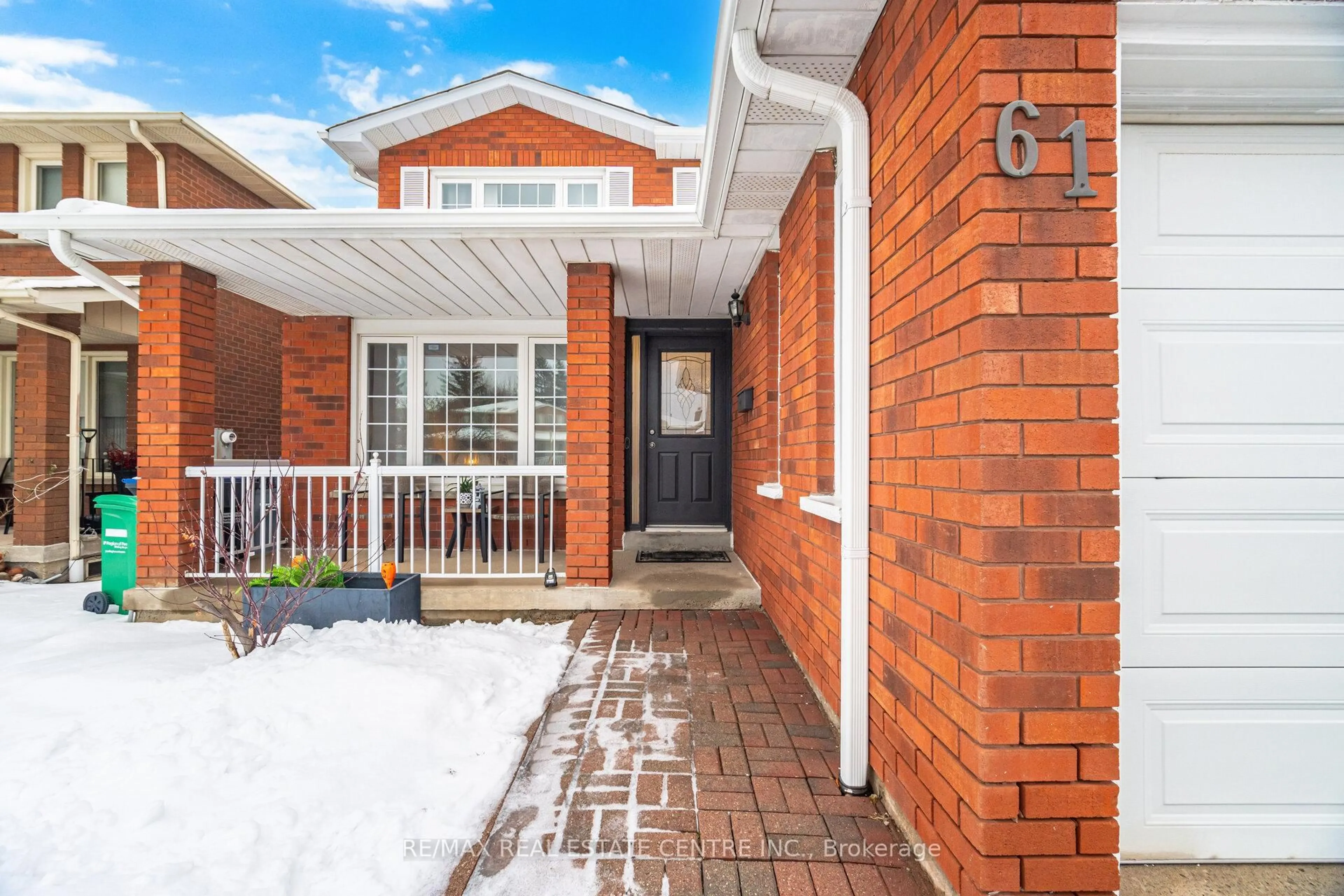 Home with brick exterior material, street for 61 Sunforest Dr, Brampton Ontario L6Z 2W7