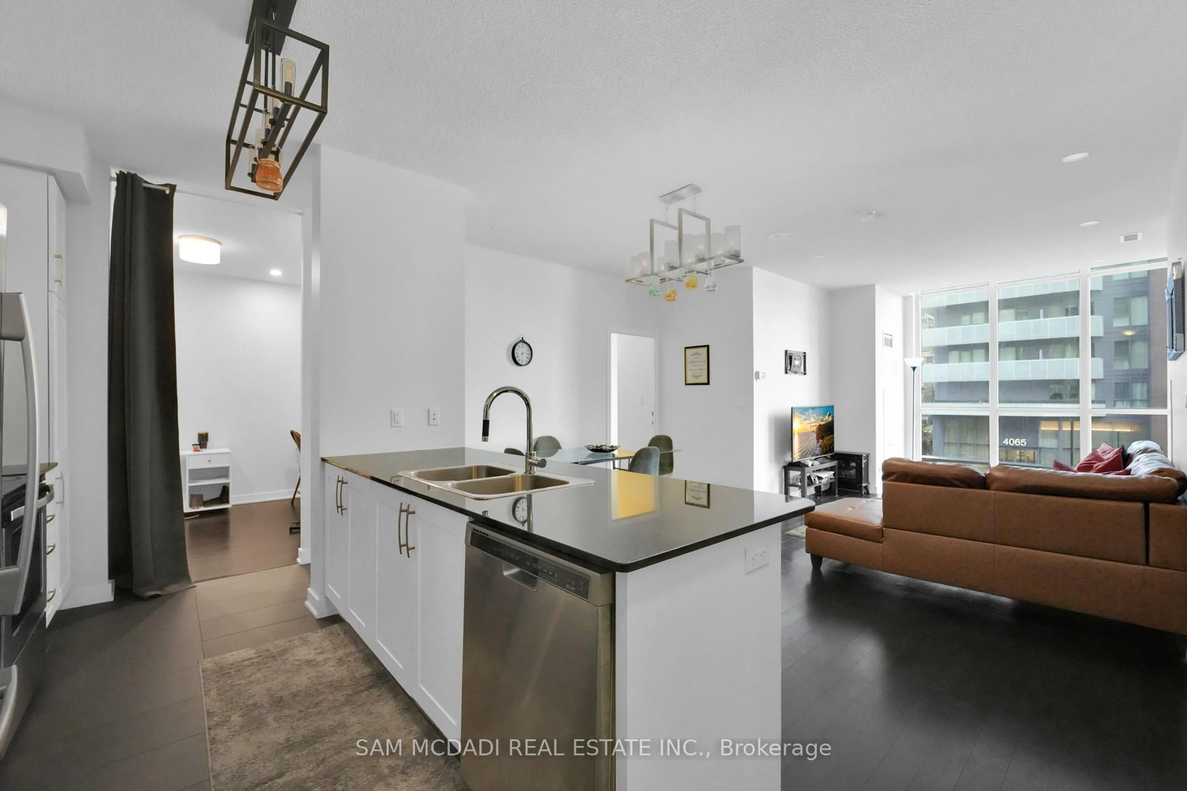 Open concept kitchen, ceramic/tile floor for 4070 Confederation Pkwy #202, Mississauga Ontario L5B 0E9