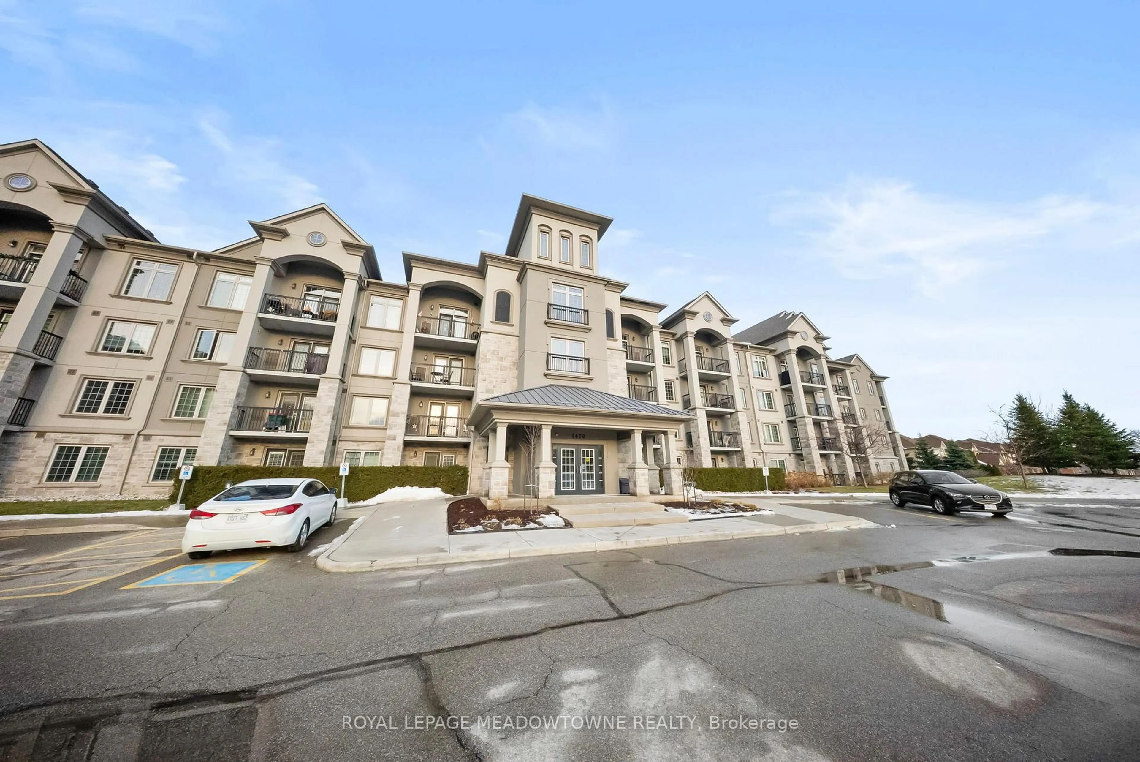 A pic from outside/outdoor area/front of a property/back of a property/a pic from drone, unknown for 1470 Main St #310, Milton Ontario L9T 8W6