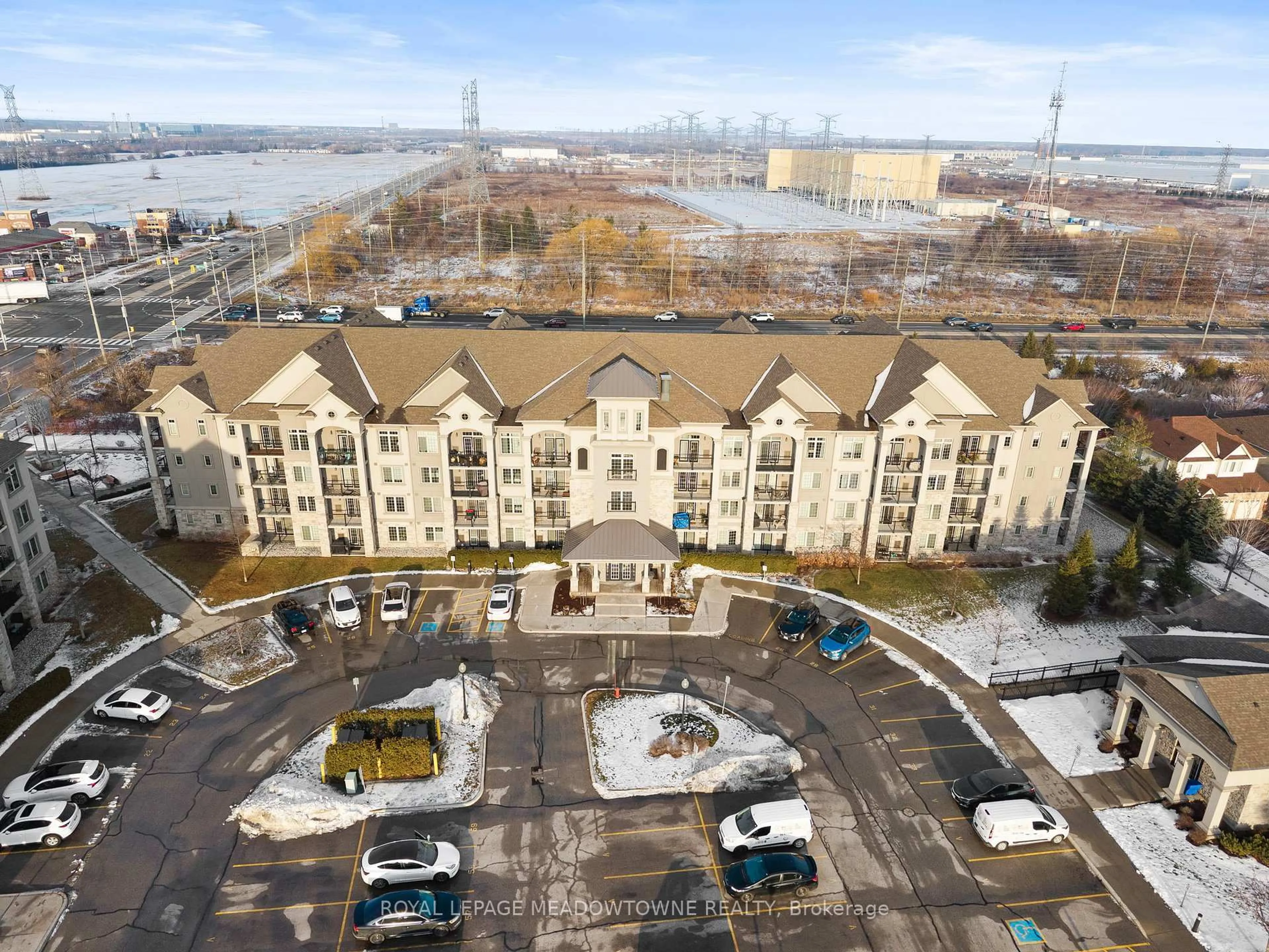 A pic from outside/outdoor area/front of a property/back of a property/a pic from drone, city buildings view from balcony for 1470 Main St #310, Milton Ontario L9T 8W6