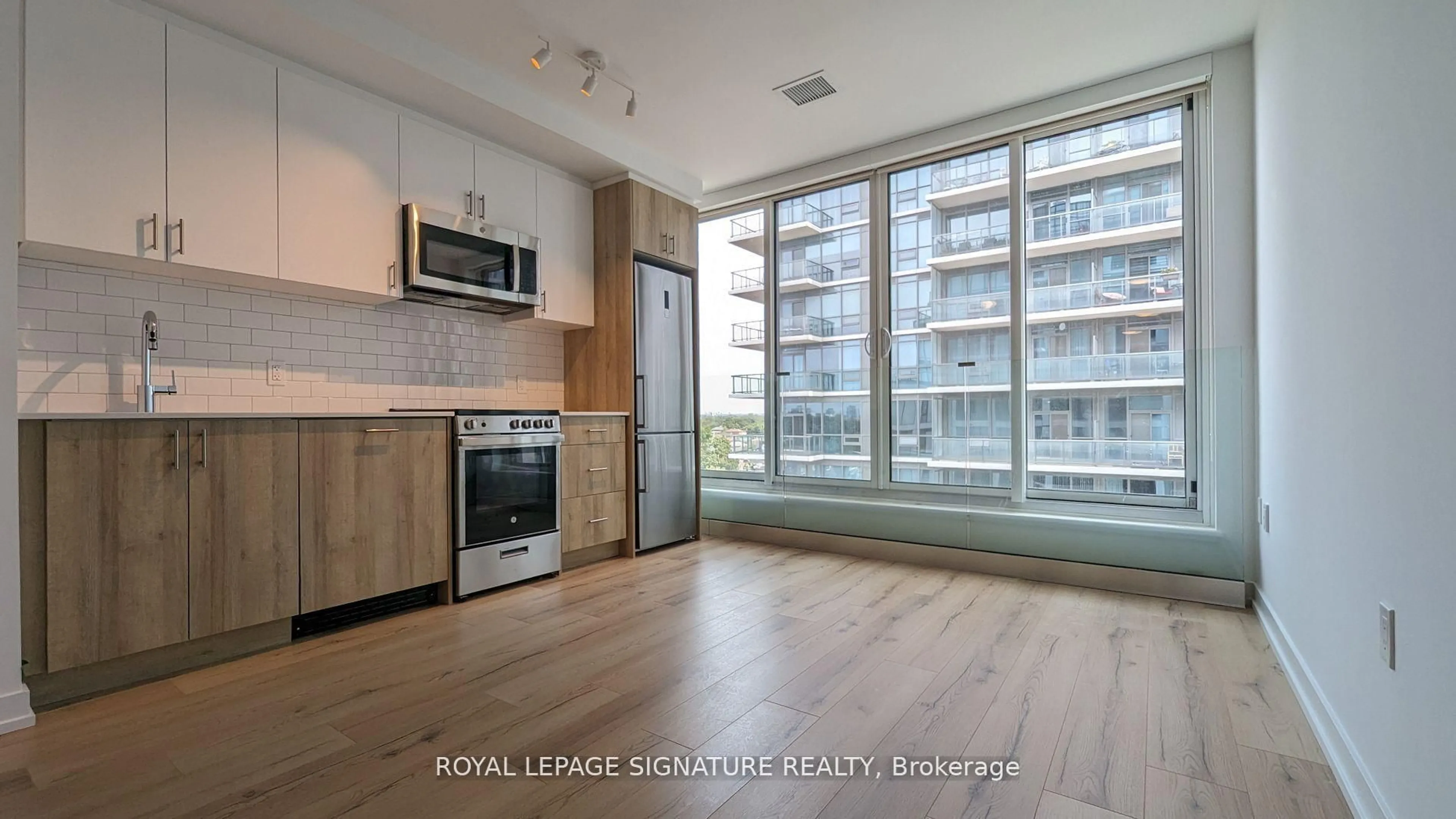 Standard kitchen, wood/laminate floor for 1195 The Queensway #610, Toronto Ontario M8Z 1R6
