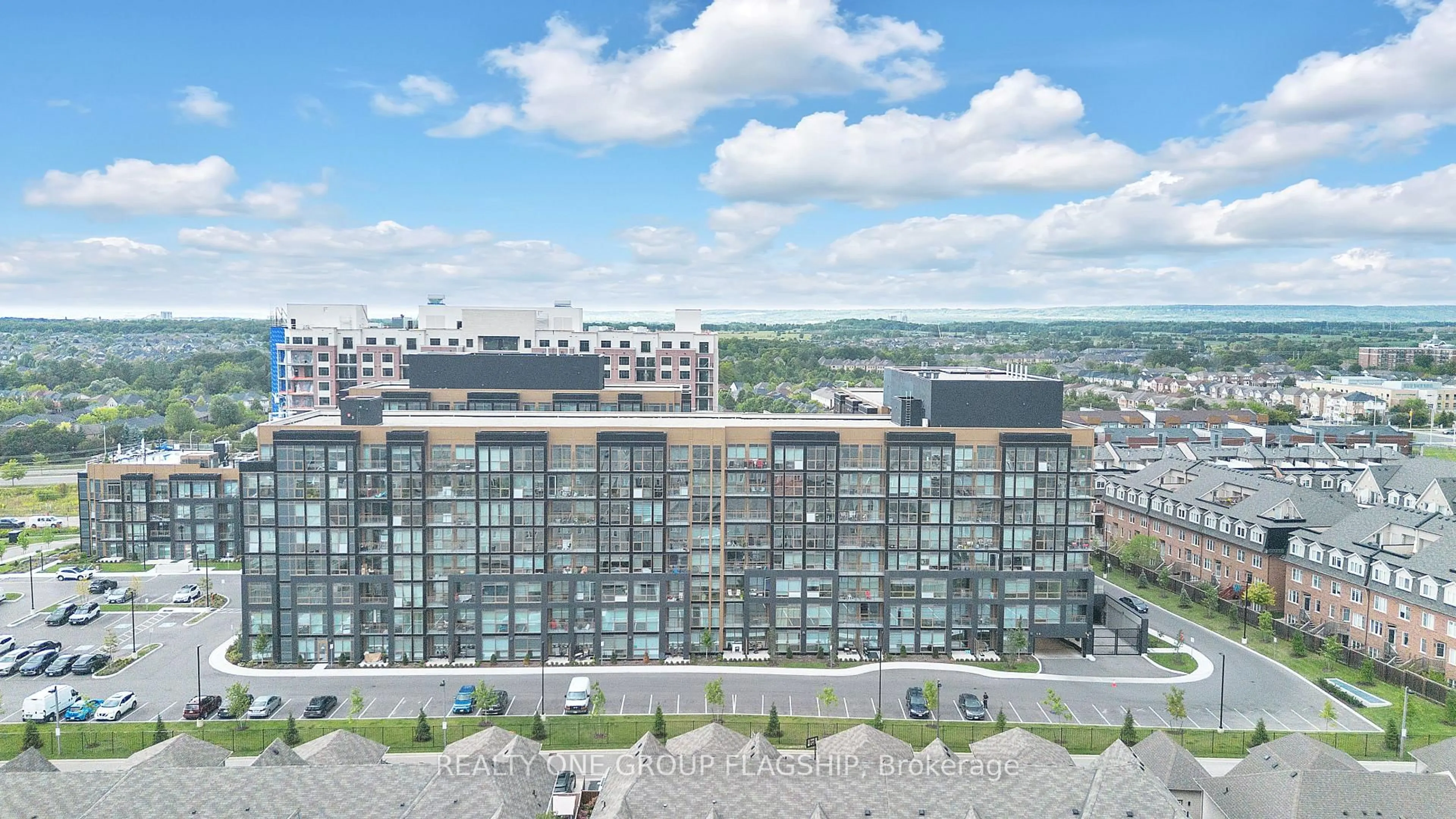 A pic from outside/outdoor area/front of a property/back of a property/a pic from drone, city buildings view from balcony for 2343 Khalsa Gate #101, Oakville Ontario L6M 5R6