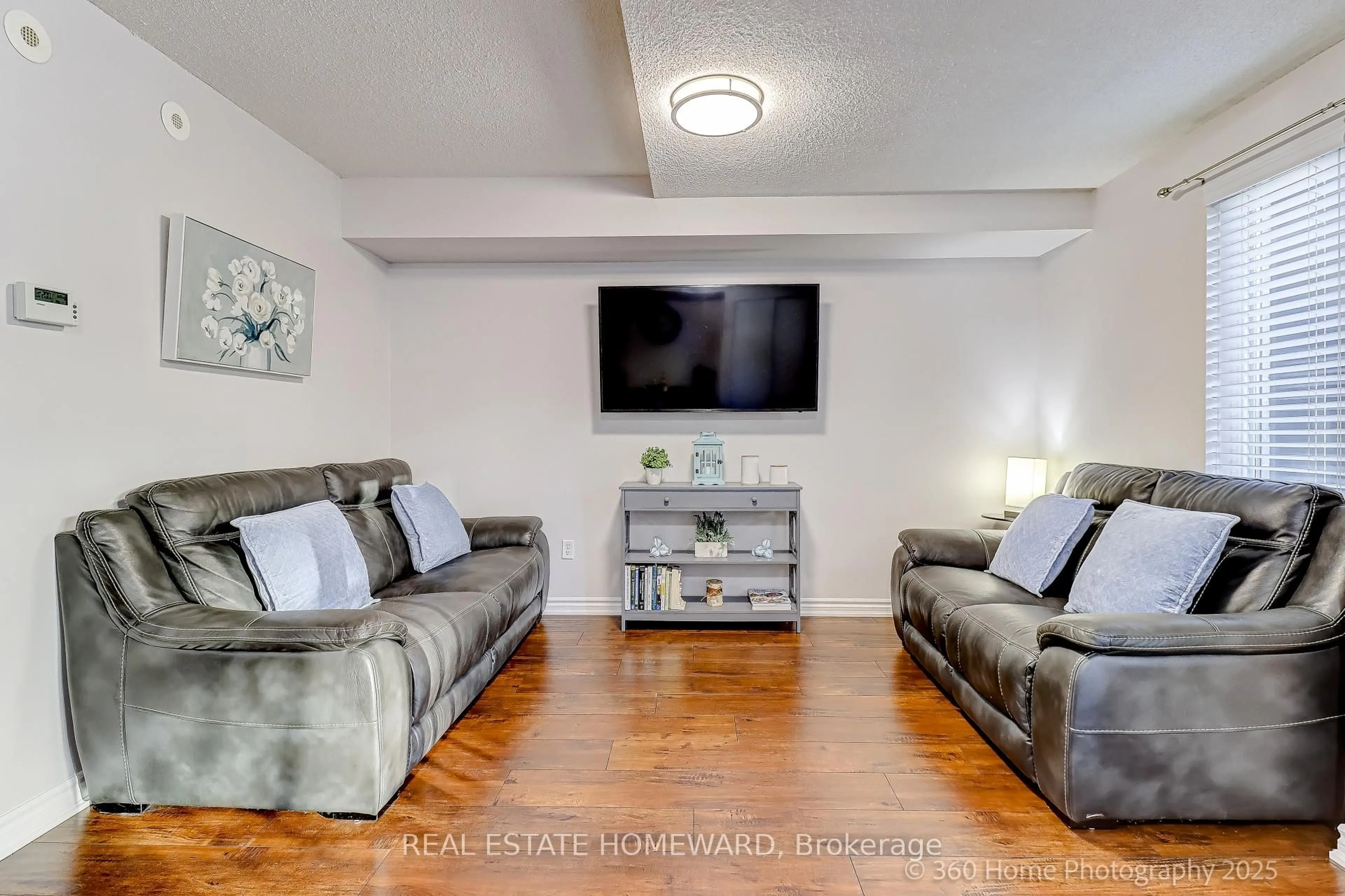 Living room with furniture, unknown for 55 George Appleton Way #1036, Toronto Ontario M3M 0A2