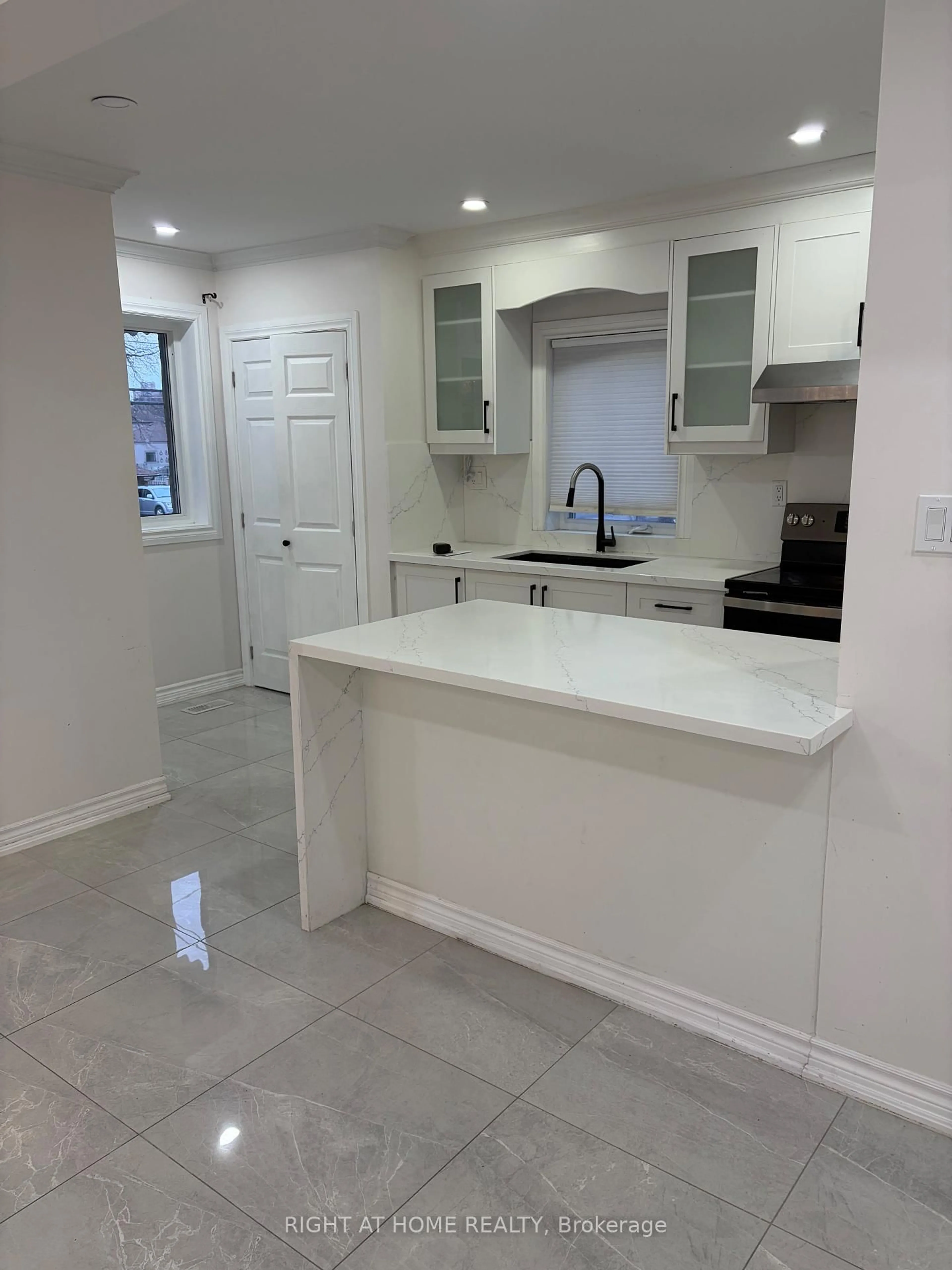 Open concept kitchen, ceramic/tile floor for 200 Gary Dr, Toronto Ontario M9N 2M4