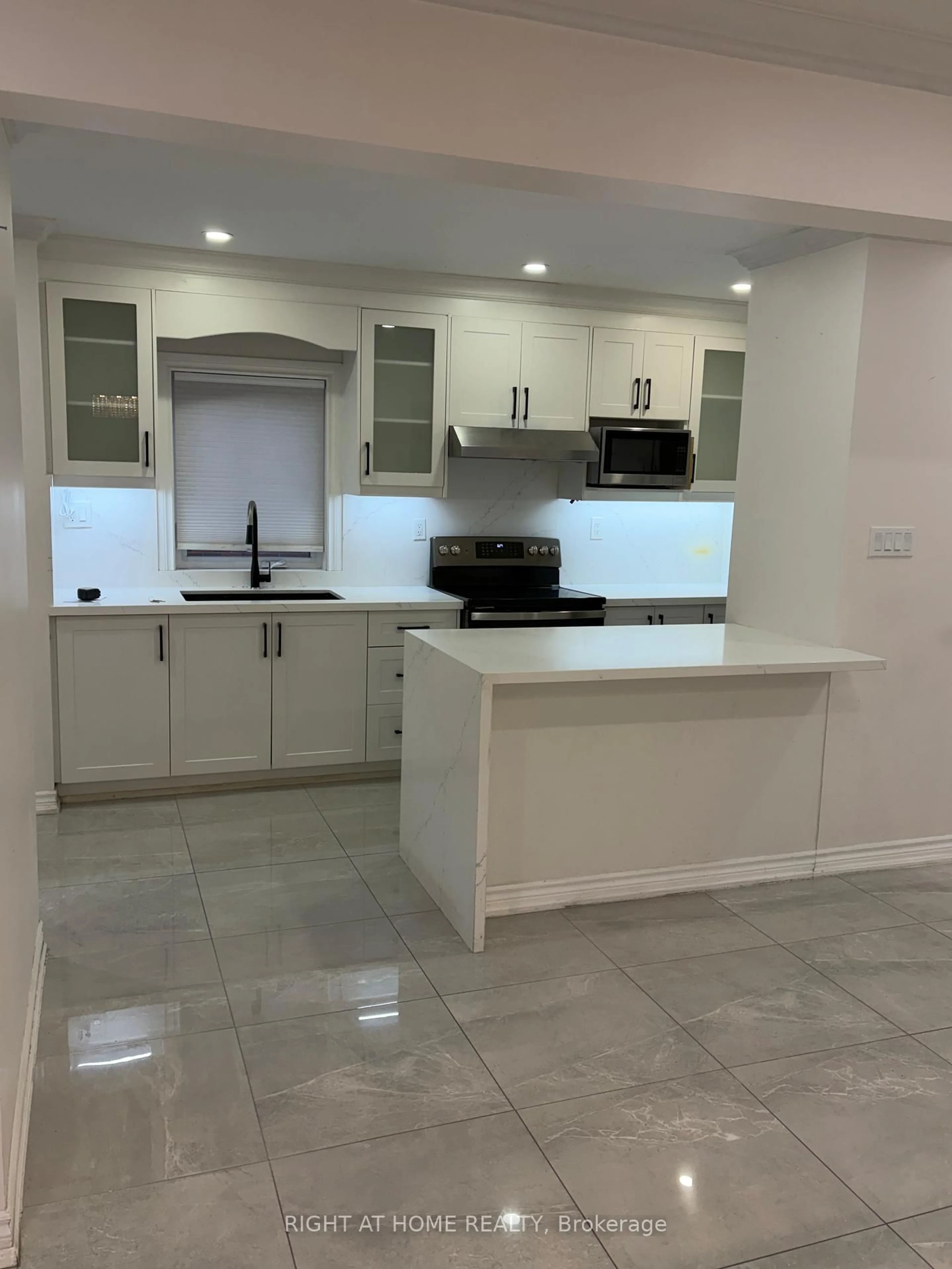 Open concept kitchen, ceramic/tile floor for 200 Gary Dr, Toronto Ontario M9N 2M4