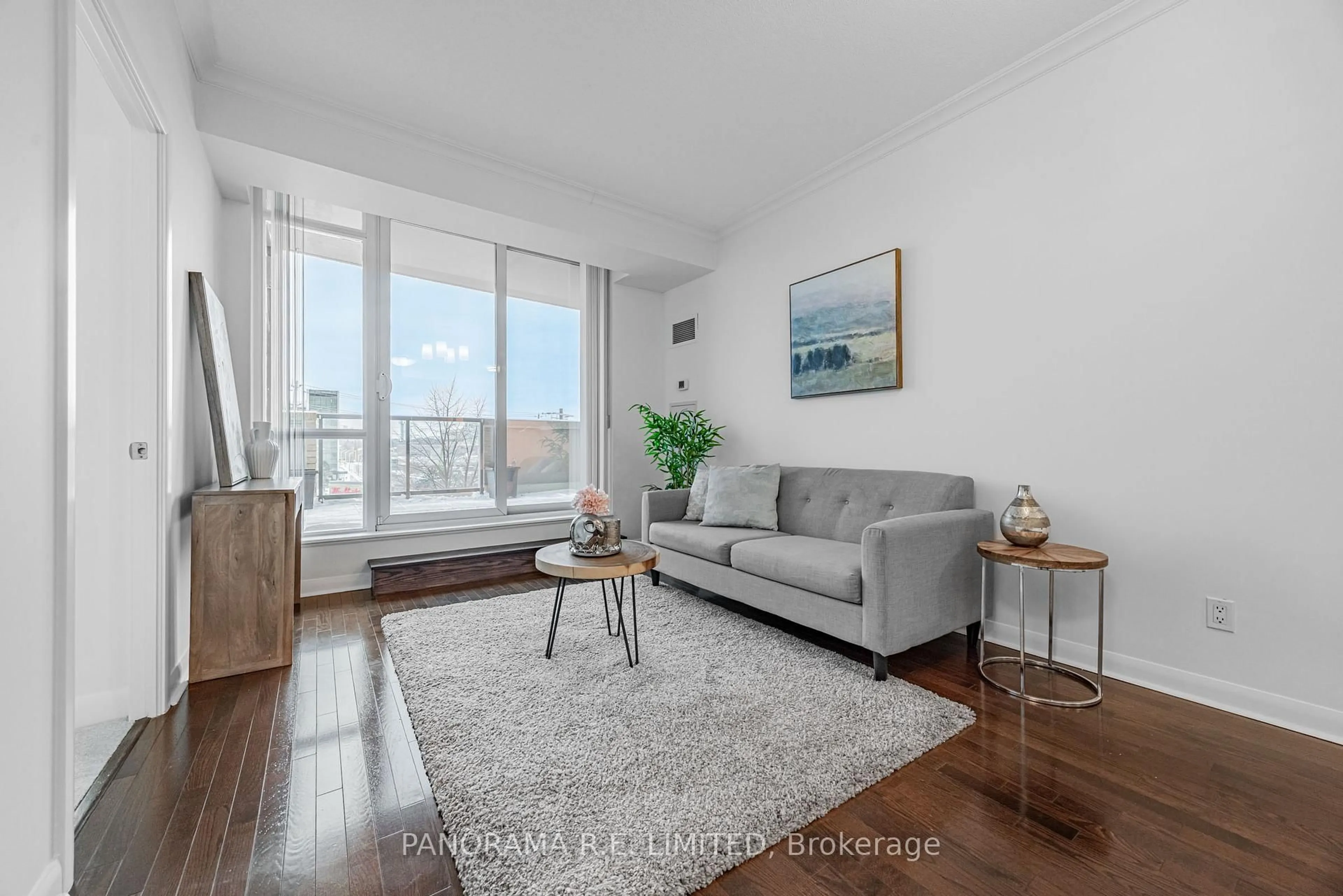 Living room with furniture, wood/laminate floor for 235 Sherway Gardens Rd #405, Toronto Ontario M9C 0A2