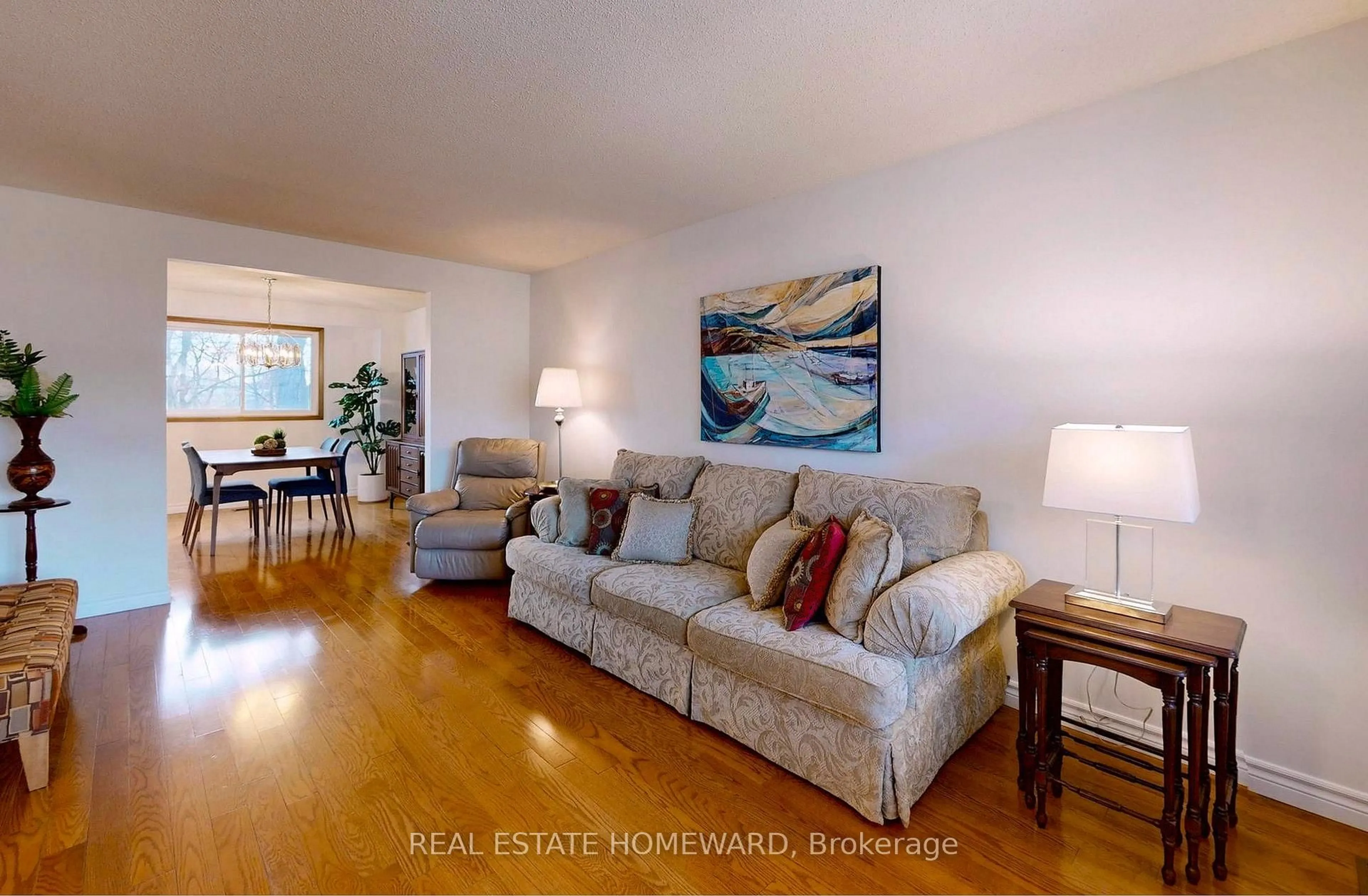 Living room with furniture, wood/laminate floor for 3058 Viewmount Rd, Oakville Ontario L6L 5M7