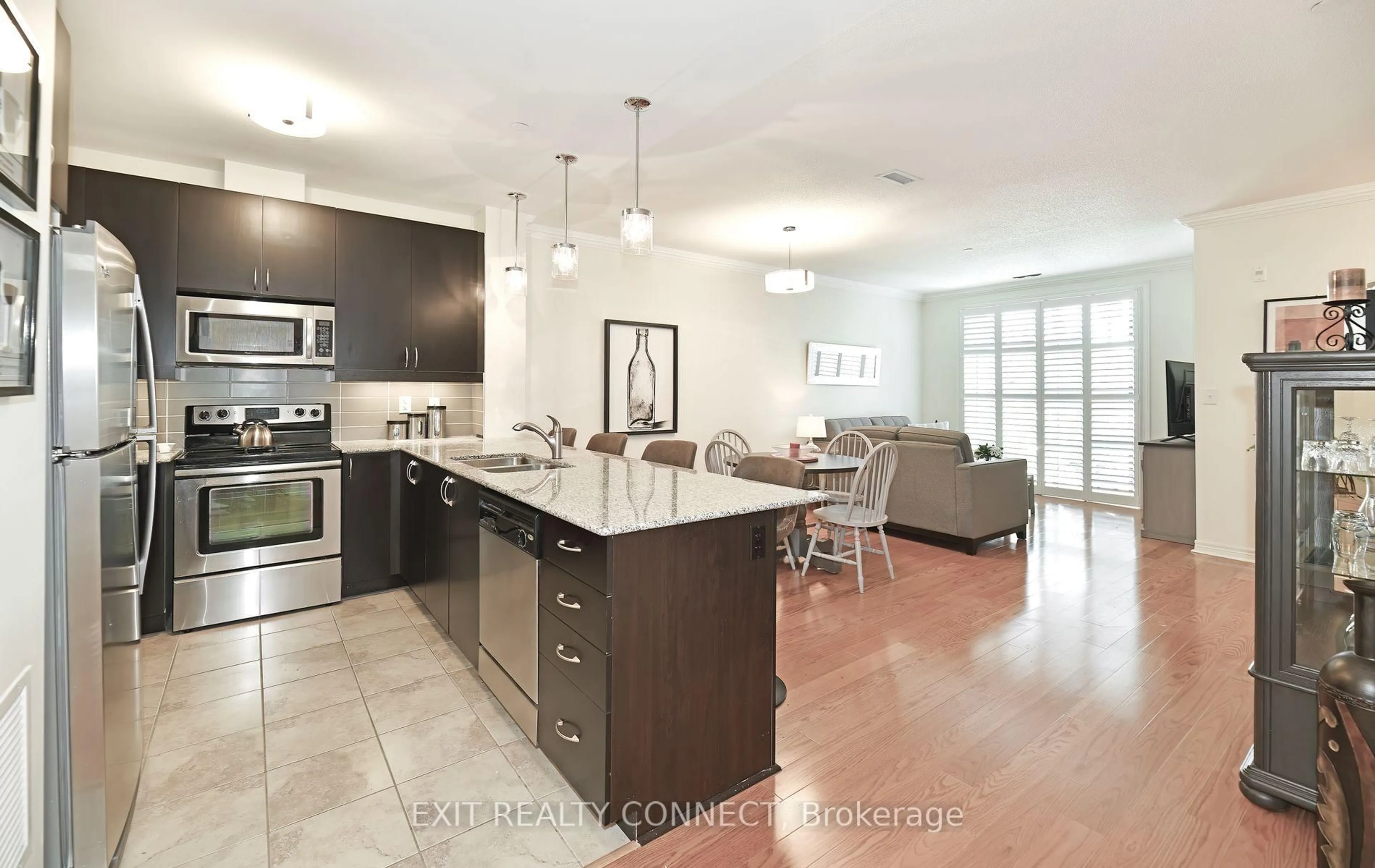 Open concept kitchen, ceramic/tile floor for 383 Main St #112, Milton Ontario L9T 8K8