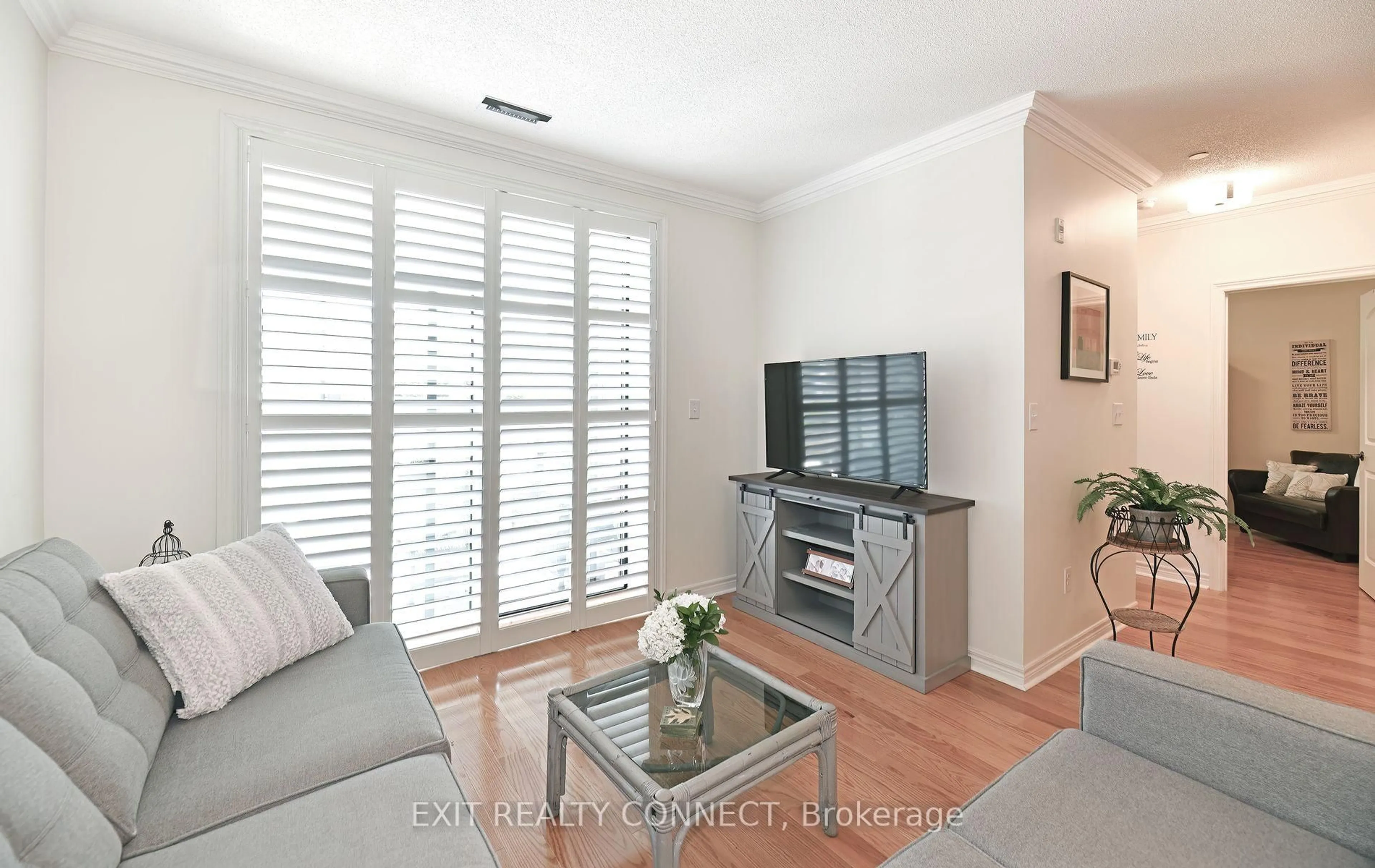 Living room with furniture, unknown for 383 Main St #112, Milton Ontario L9T 8K8