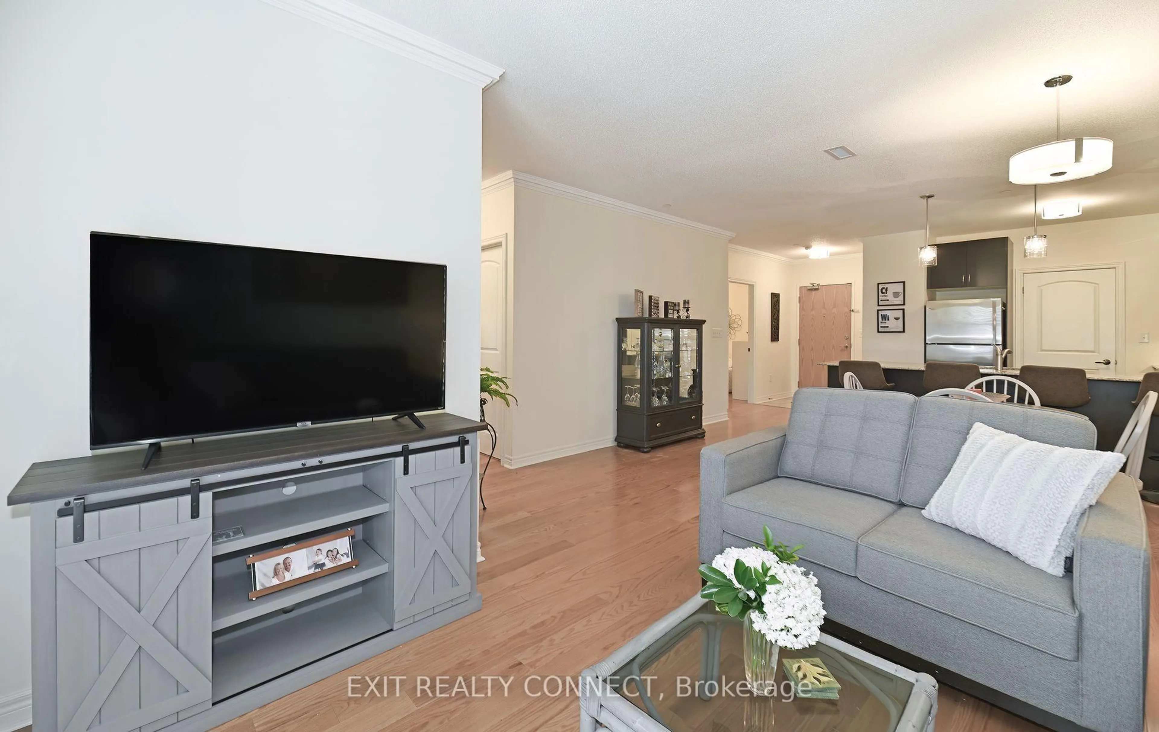 Living room with furniture, unknown for 383 Main St #112, Milton Ontario L9T 8K8
