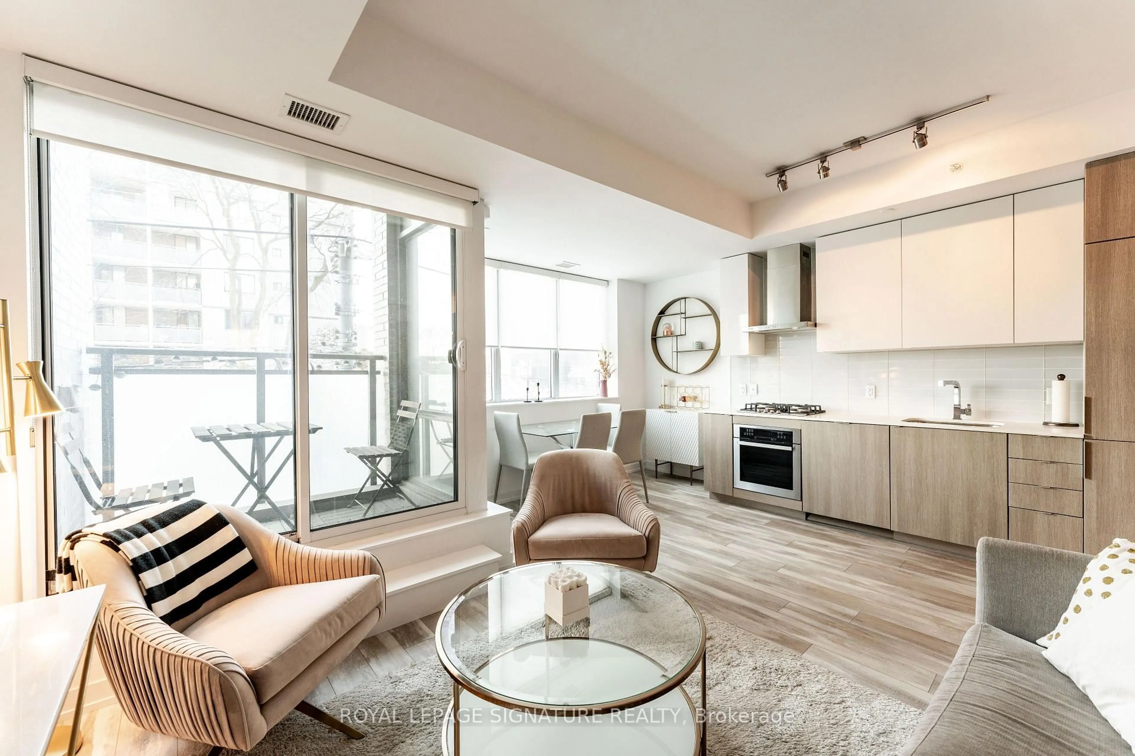 Living room with furniture, unknown for 38 Howard Park Ave #219, Toronto Ontario M6R 0A7