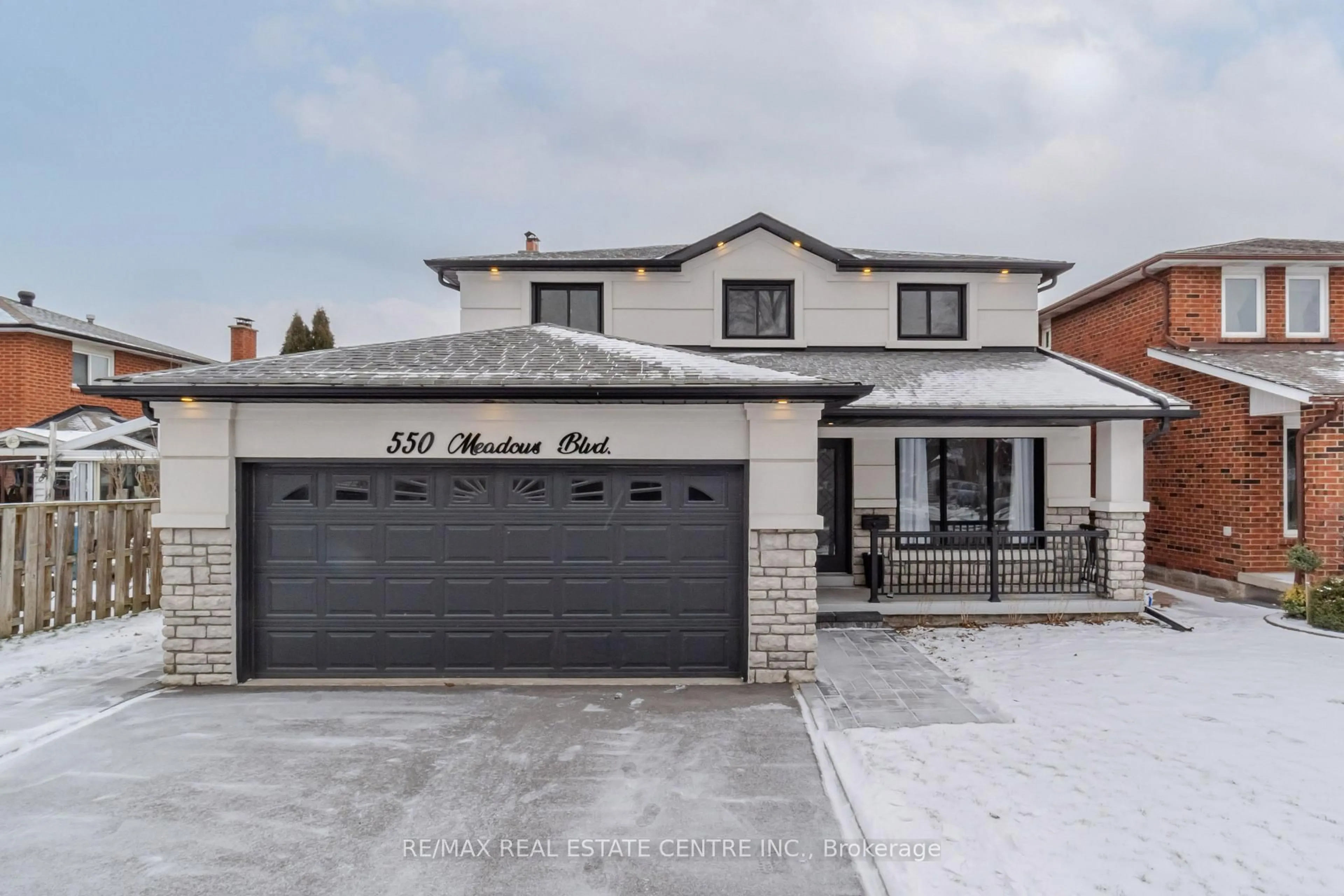 Home with brick exterior material, street for 550 Meadows Blvd, Mississauga Ontario L4Z 1G6