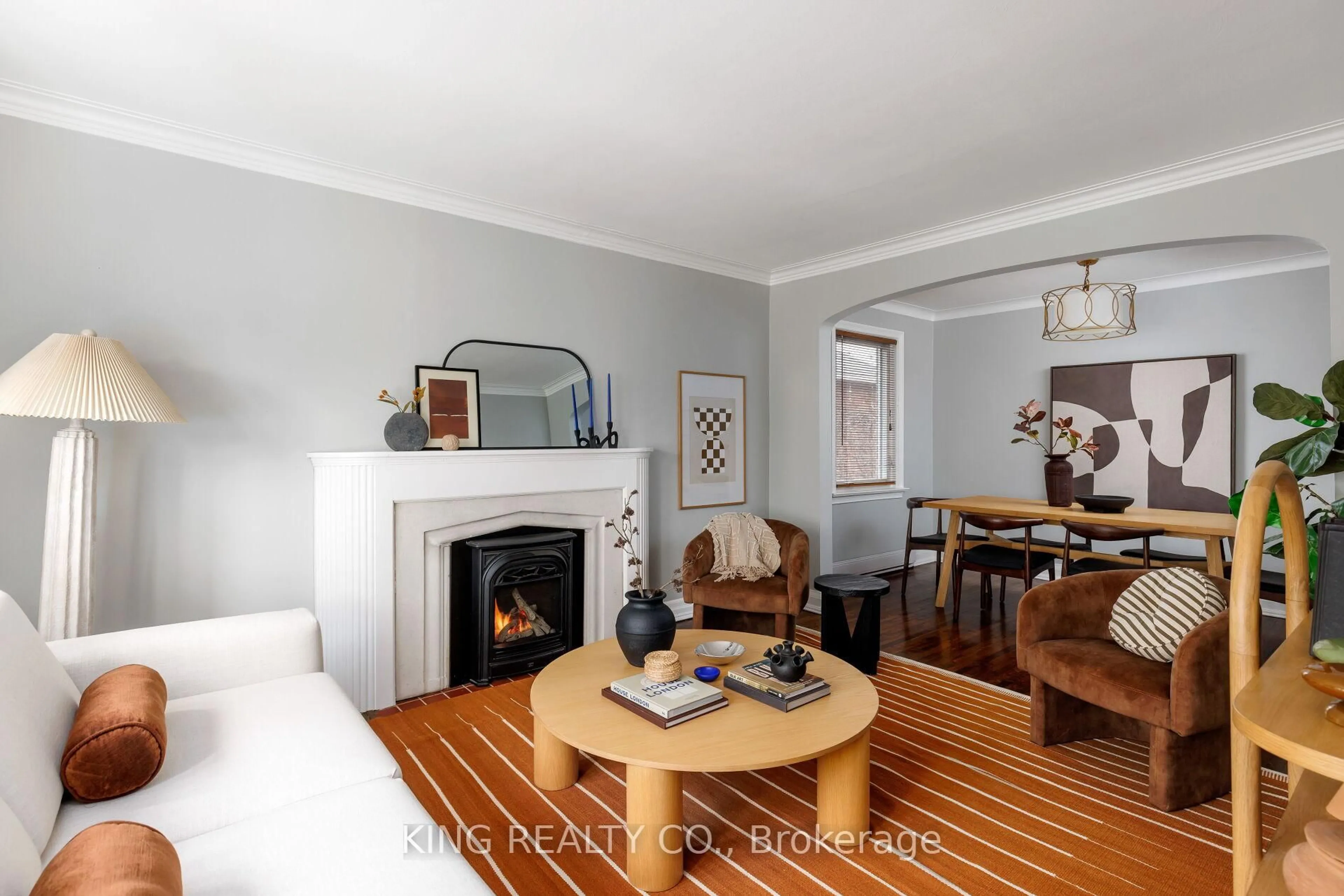 Living room with furniture, wood/laminate floor for 6 Glamis Ave, Toronto Ontario M6N 4H4