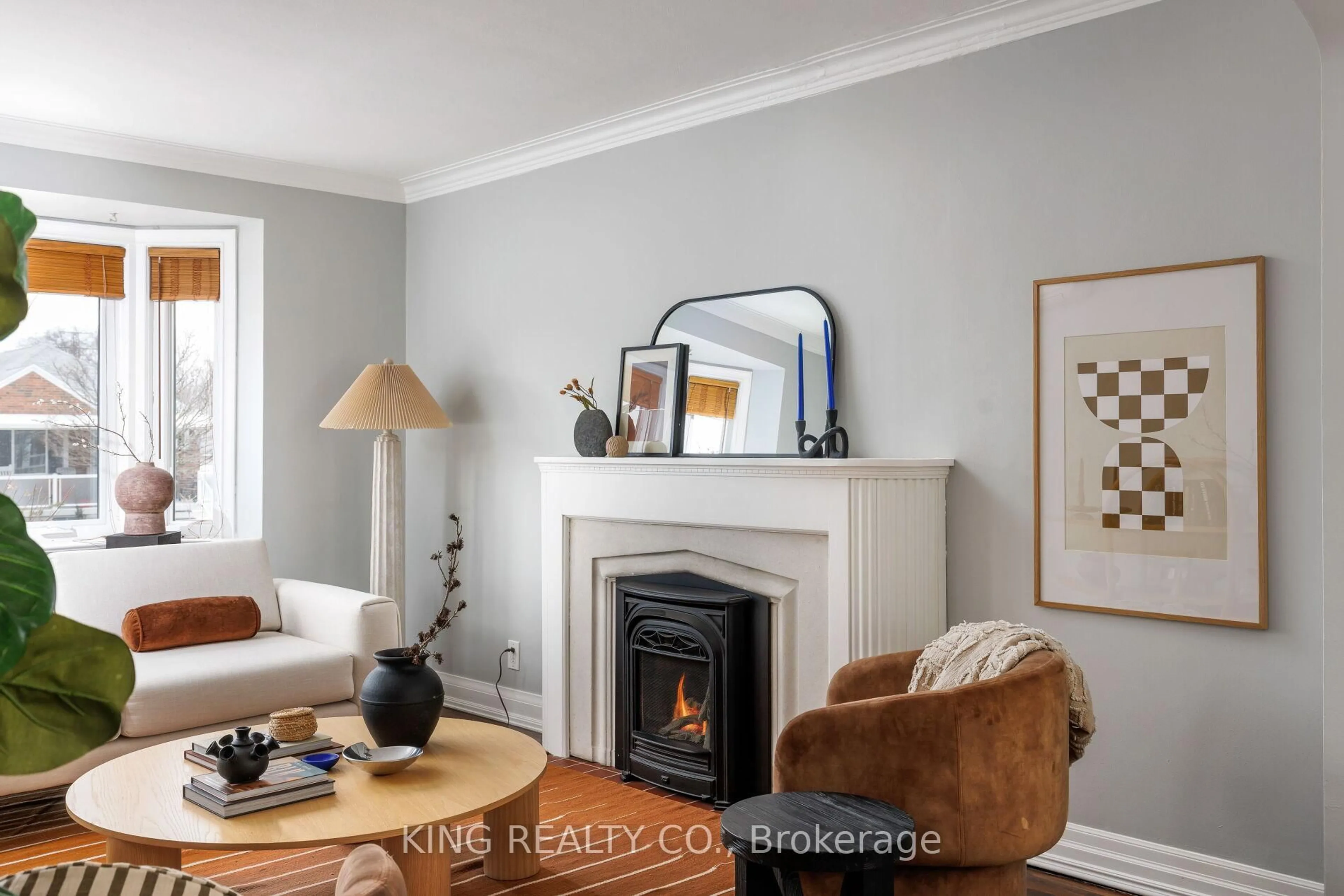 Living room with furniture, wood/laminate floor for 6 Glamis Ave, Toronto Ontario M6N 4H4