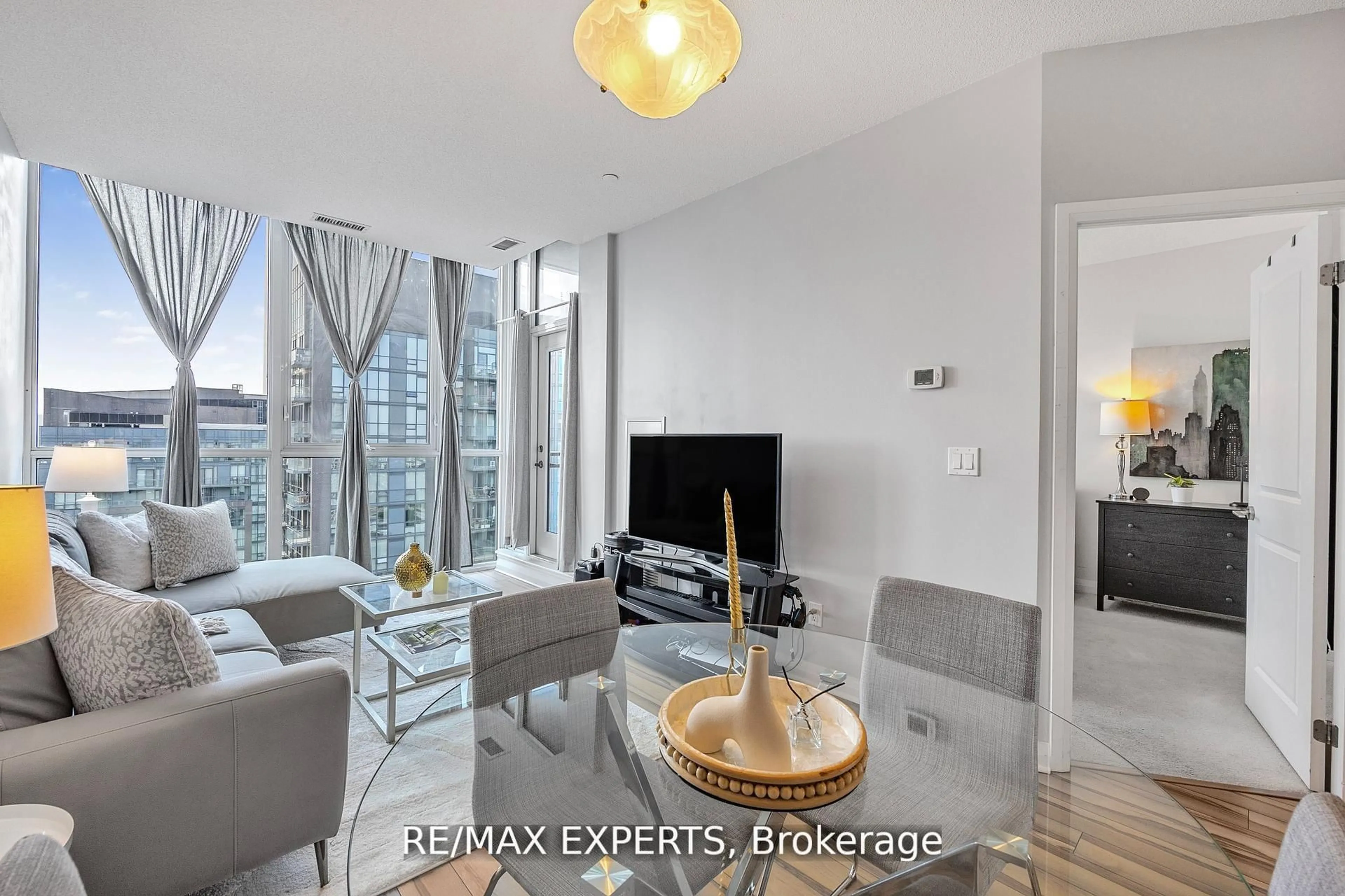 Living room with furniture, unknown for 75 Eglinton Ave #2408, Mississauga Ontario L5R 0E5